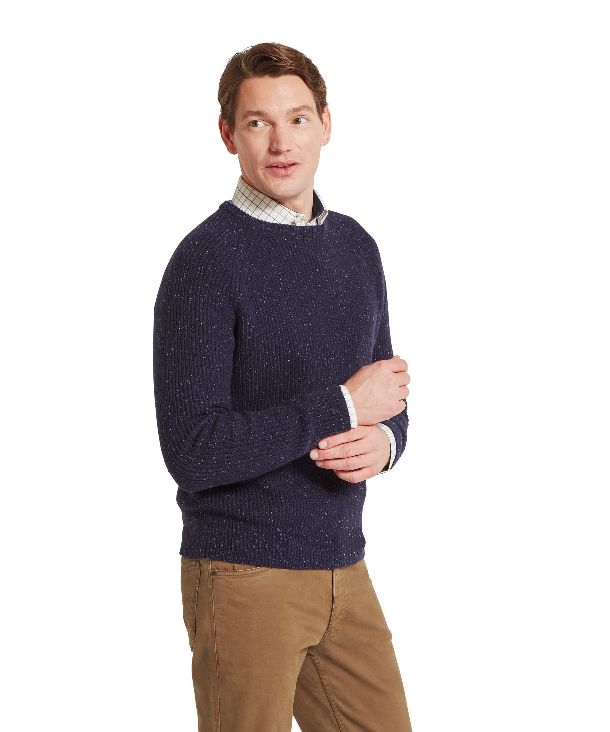 Close-up neckline detail of the Schöffel Men's Balmaha Crew Neck Jumper in Blue, showing the chunky ribbed navy donegal lambswool texture and check shirt collar visible above the crew neck.