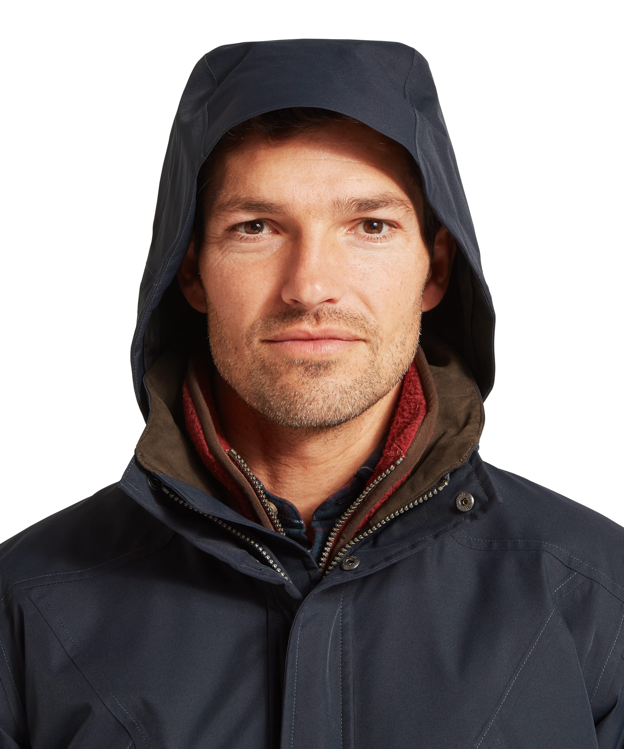 Close-up back collar detail of the Schöffel Men's Barrow Country Coat in Navy, showing the Schöffel leather badge, concealed hood storage panel, and clean tailored seaming on the navy waterproof shell fabric.