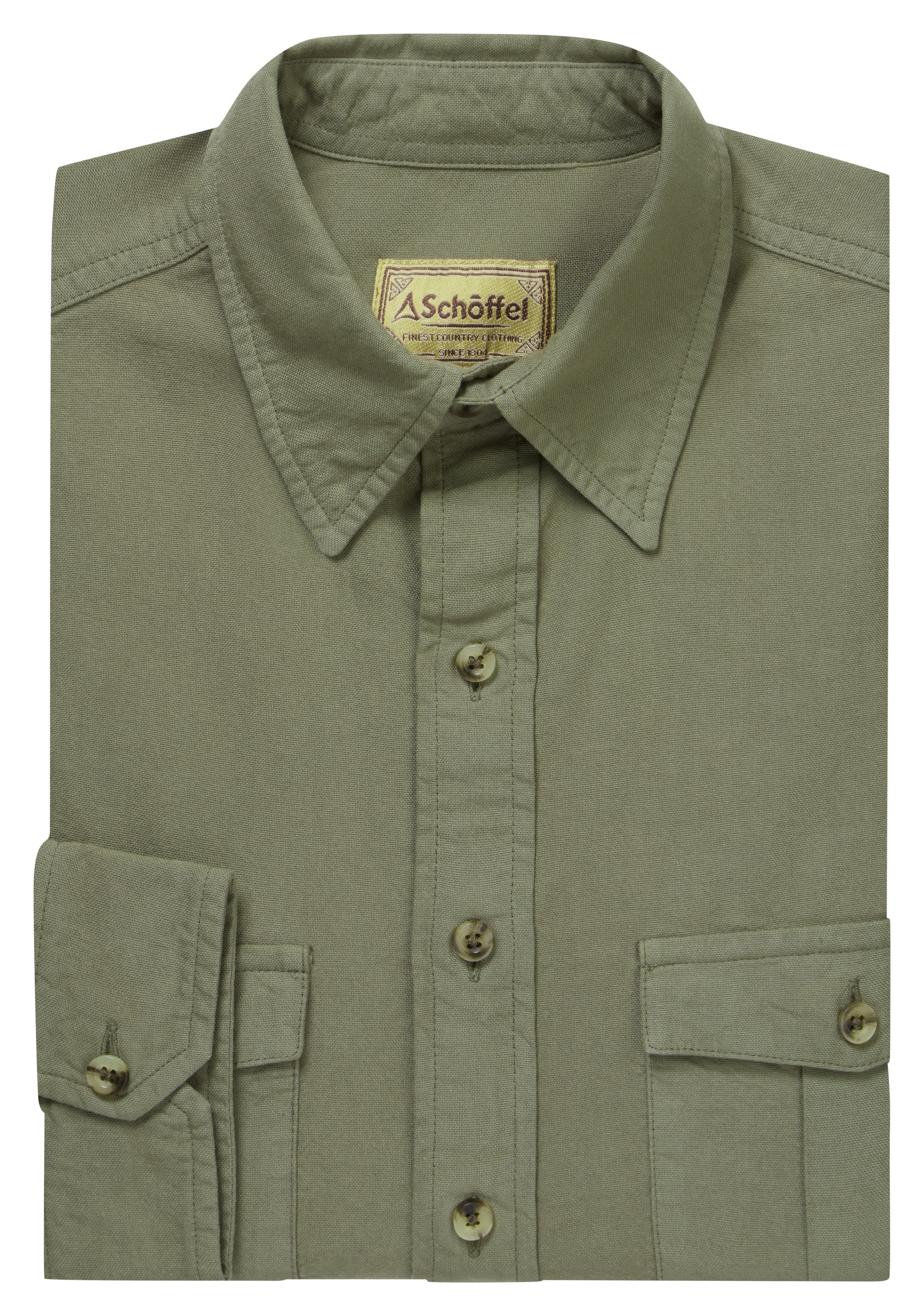 Green shirt with buttonf folded on a white background