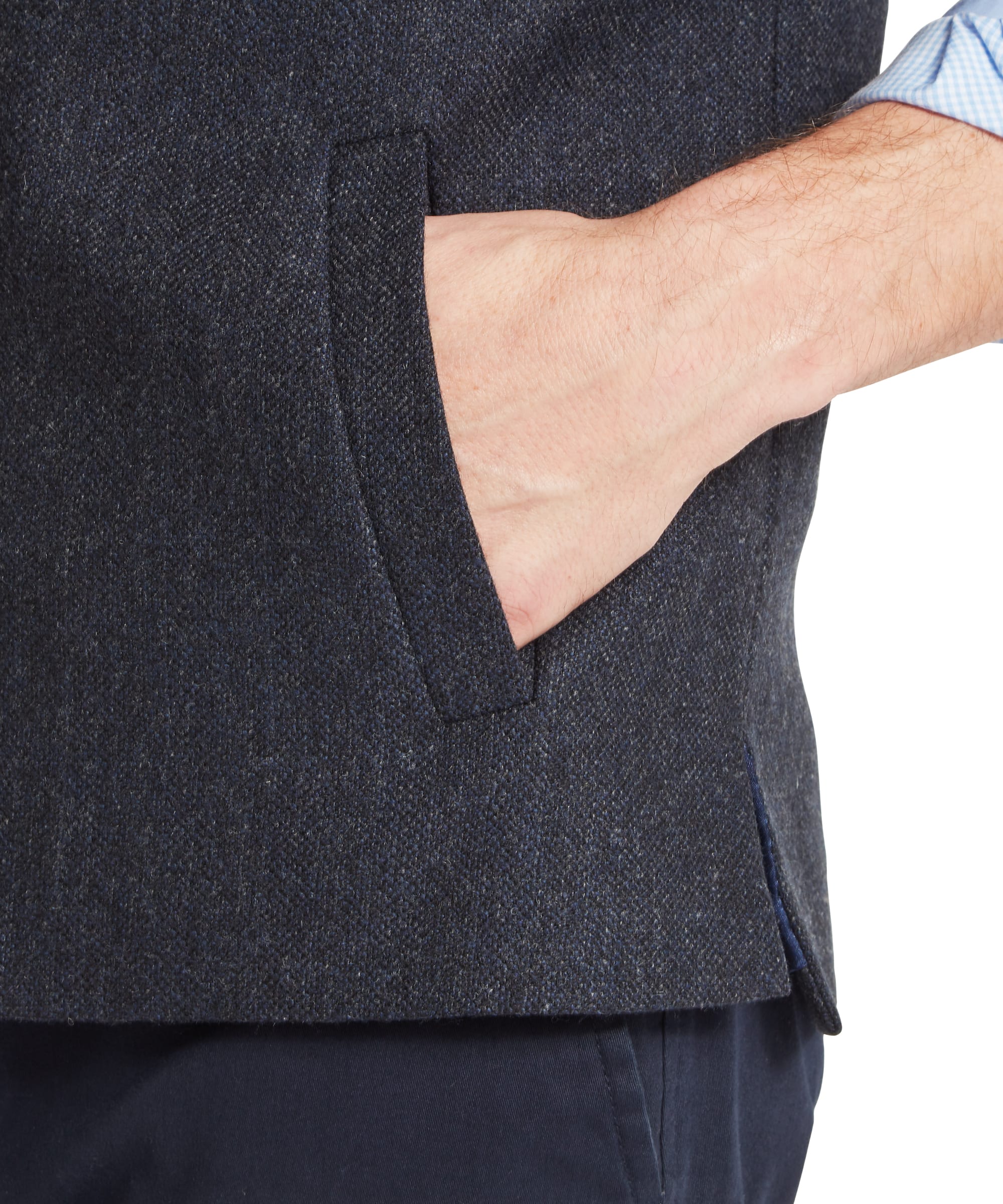 Schöffel Men's Berwick Nehru Tweed Waistcoat in Navy - rear view showing the clean tailored back with a central vent and smooth finish of the navy Lovat Tweed fabric, worn with a blue check shirt and navy trousers.