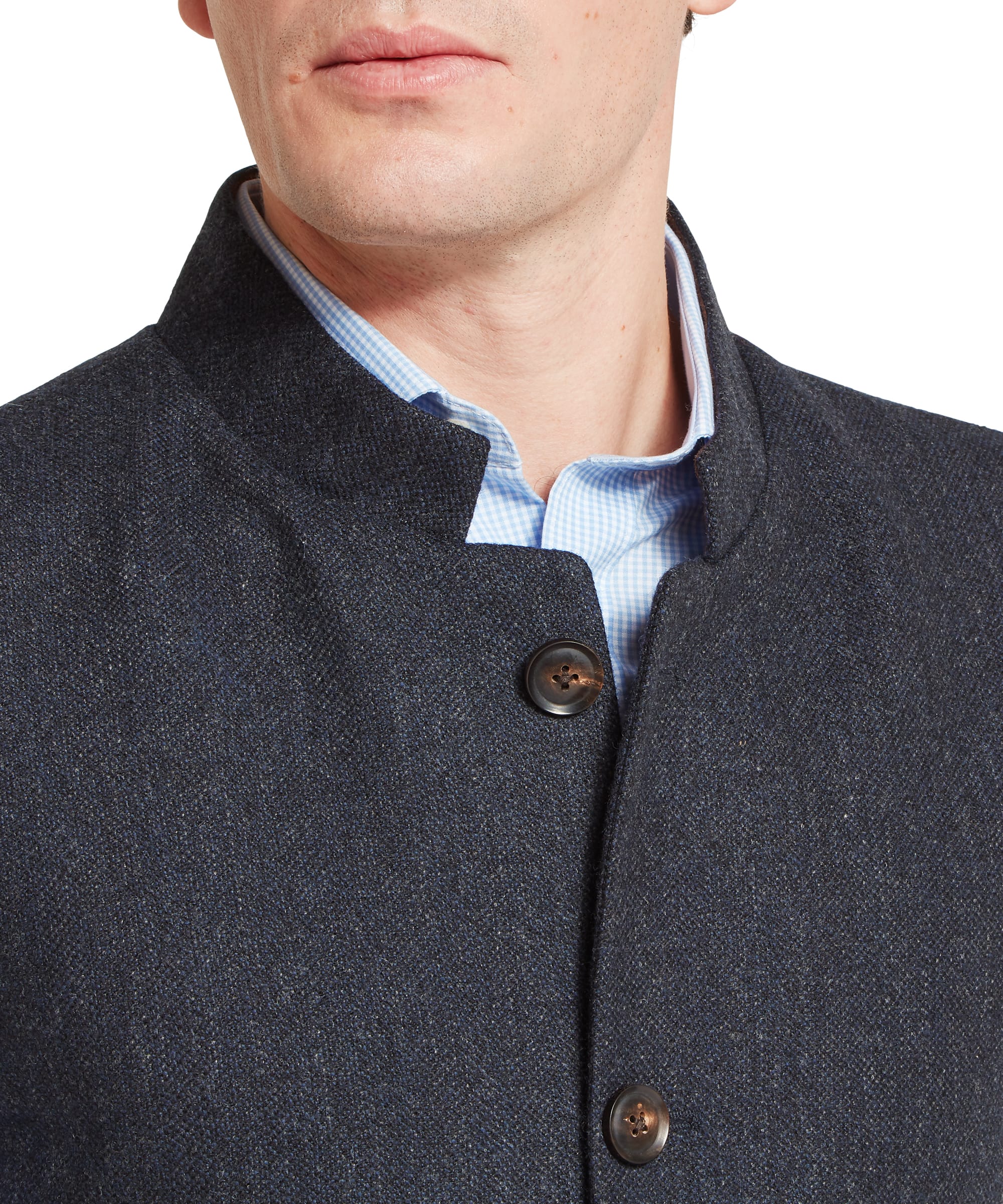 Close-up pocket detail of the Schöffel Men's Berwick Nehru Tweed Waistcoat in Navy, showing the welt side pocket and the rich dark navy herringbone tweed texture of the Lovat Tweed fabric.