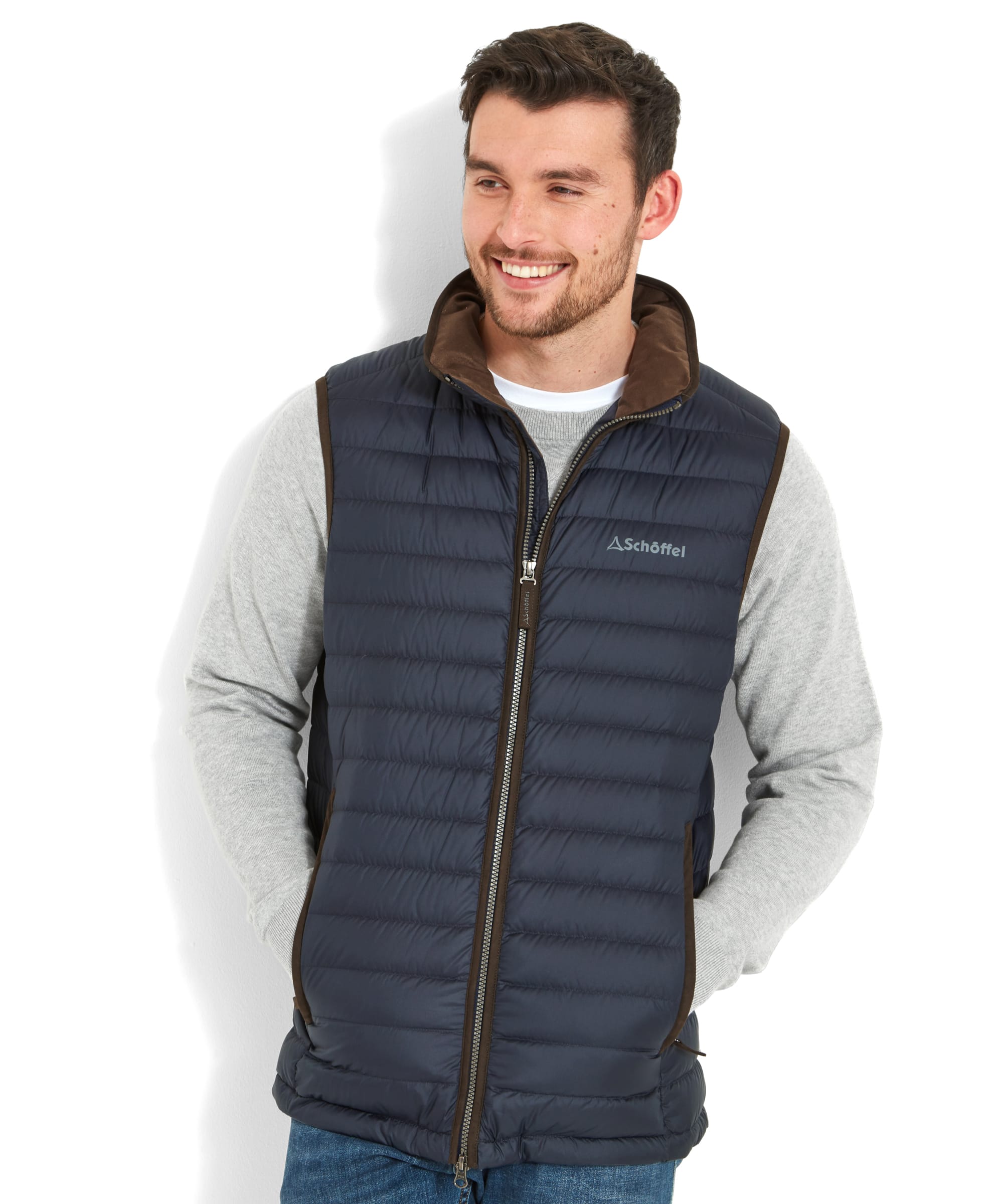 Navy blue quilted Bowden Down gilet with brown trim and matching hood made from insulated fabric for warmth