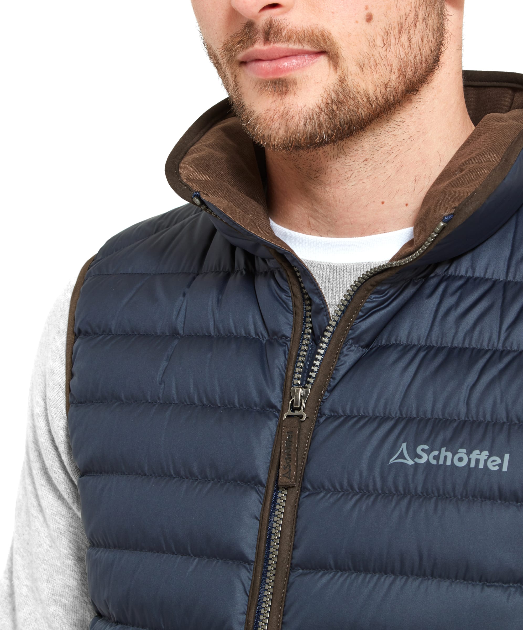 Navy blue quilted Bowden Down Gilet puffer vest with brown zipper and collar lining ideal for outdoor layering