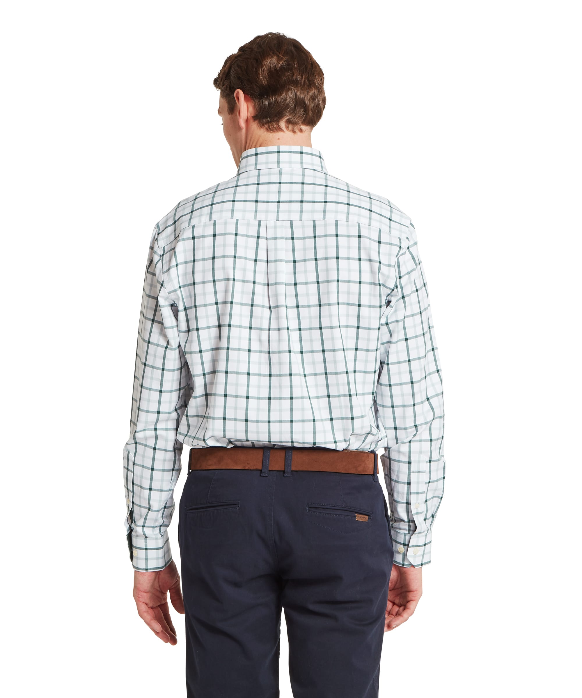 Schöffel Men's Brancaster Classic Shirt in Green - rear view showing the centre box pleat and classic cut of the white ground green windowpane check shirt, worn tucked into navy chinos with a tan leather belt.