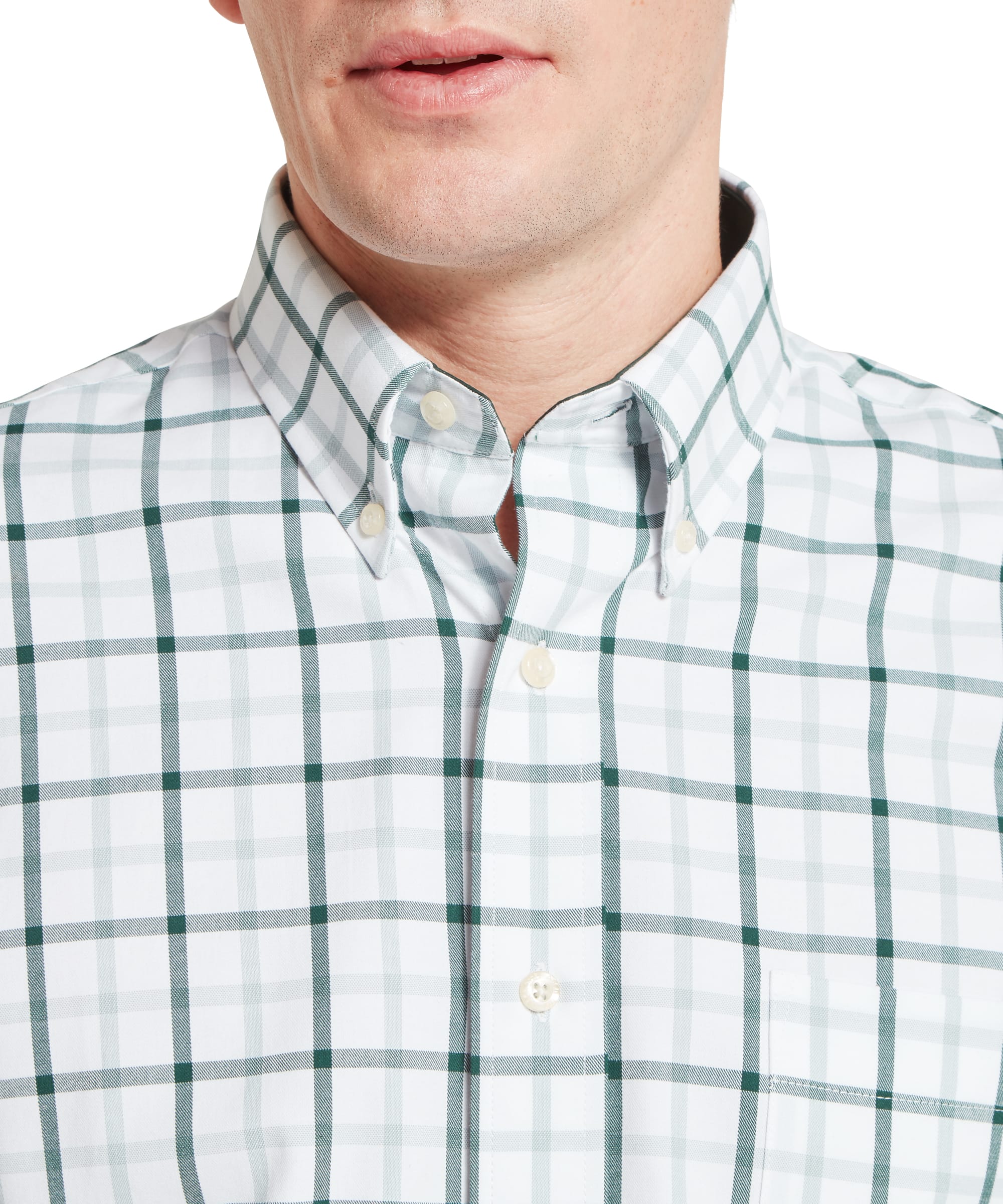Schöffel Men's Brancaster Classic Shirt in Green - full-length front view worn tucked into navy chinos with a tan leather belt and brown suede tassel loafers, showing the smart country casual styling.