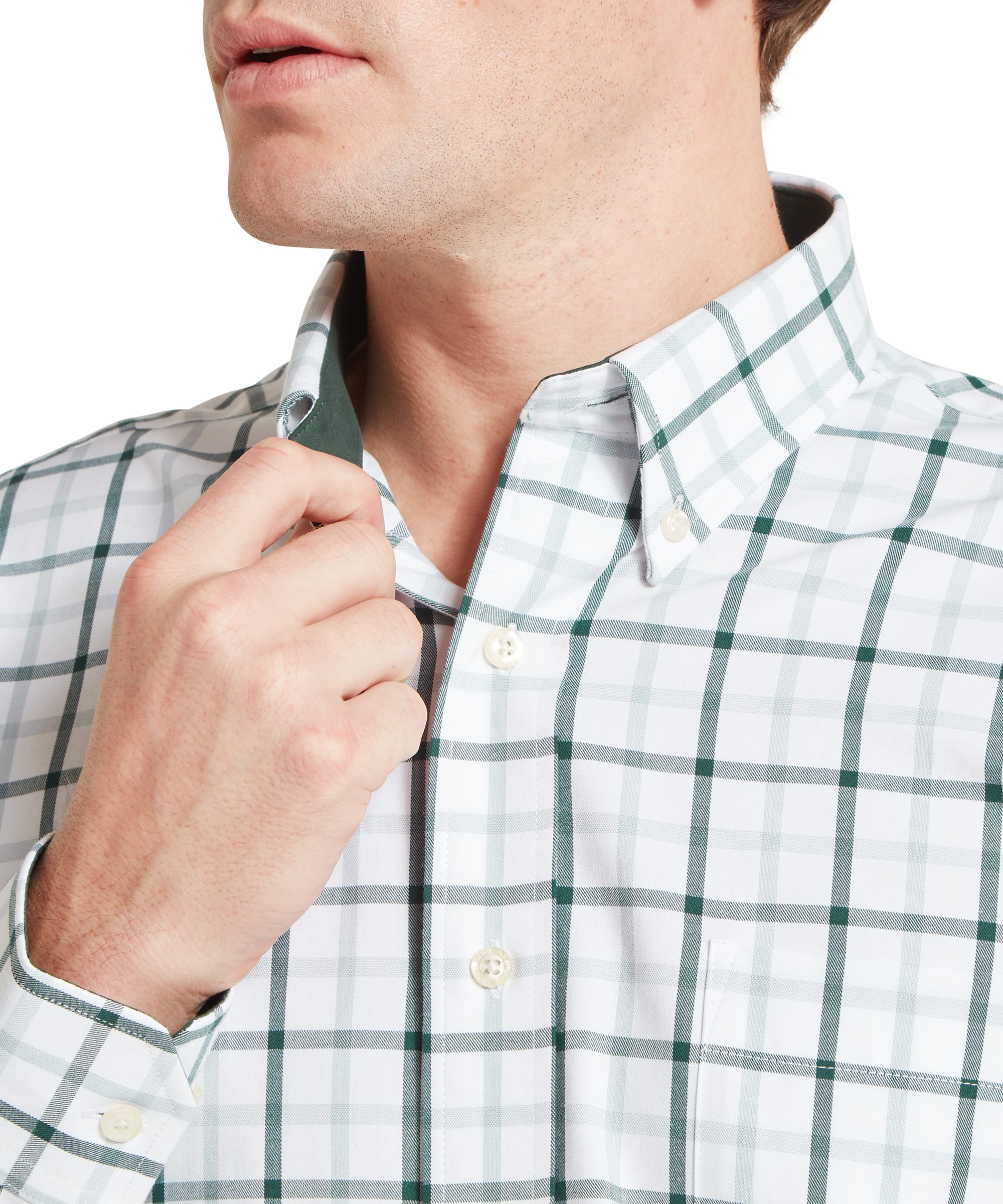 Close-up collar detail of the Schöffel Men's Brancaster Classic Shirt in Green, showing the open button-down collar and the bold green and light grey windowpane check cotton fabric with cream buttons.