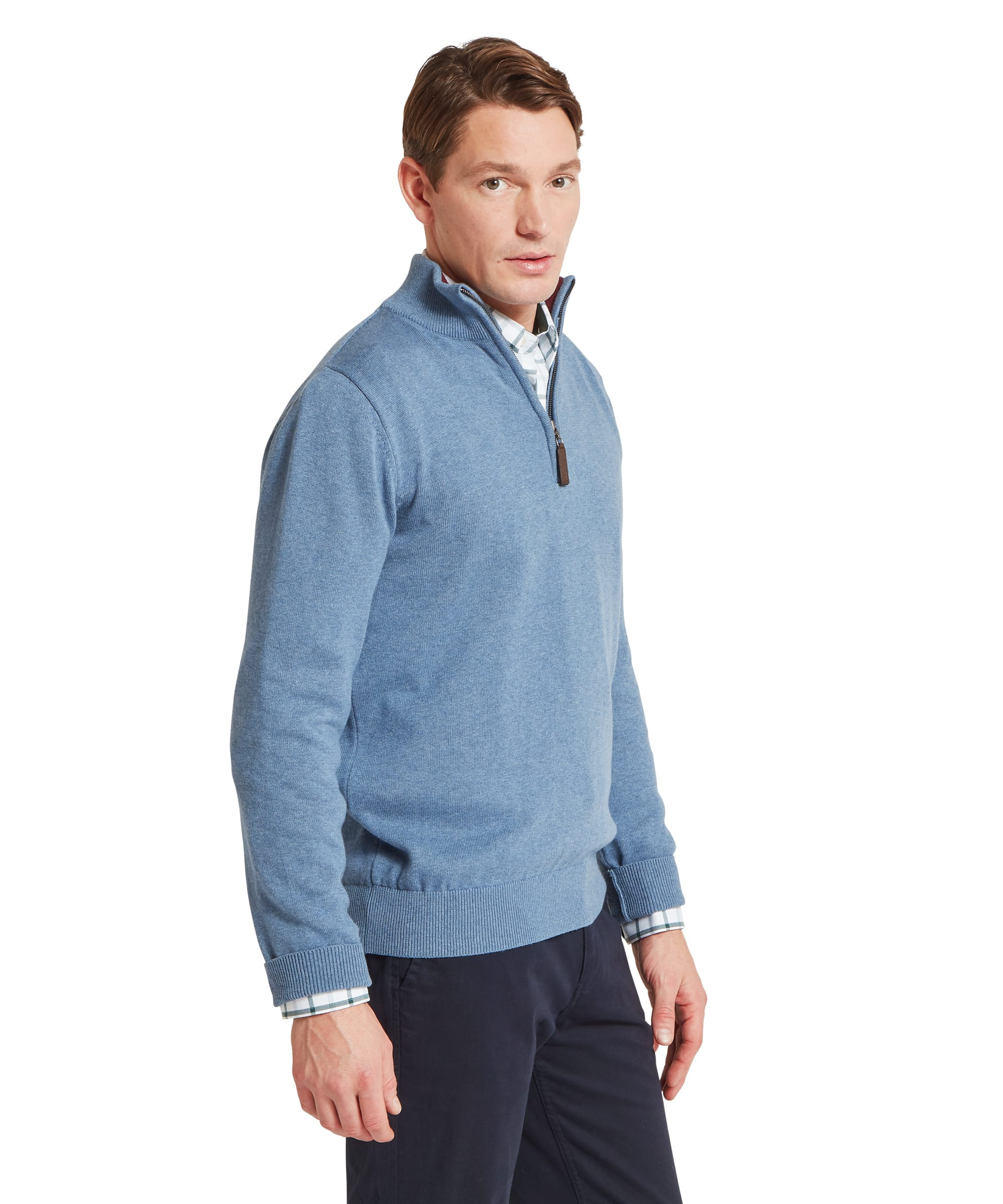 Schöffel Men's Calton Cotton Cashmere Quarter Zip Jumper in Blue - three-quarter side view showing the relaxed fit and soft marl texture of the denim-blue cotton-cashmere quarter-zip with leather zip pull, layered over a check shirt.