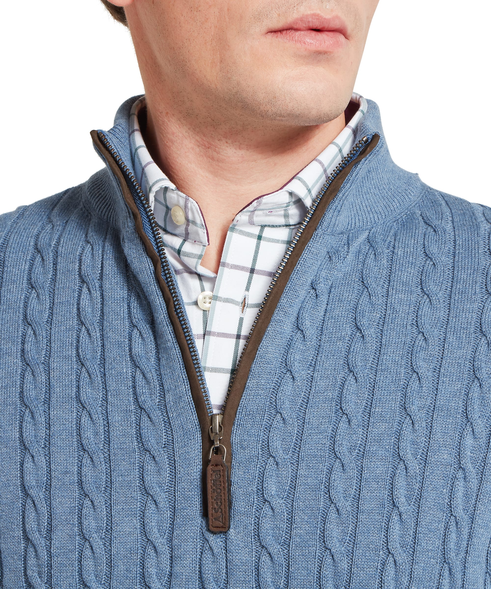Schöffel Men's Calton Cotton Cashmere Cable 1/4 Zip Jumper in Blue — close-up of leather-trimmed zip, branded Schöffel pull tab and open quarter-zip neckline