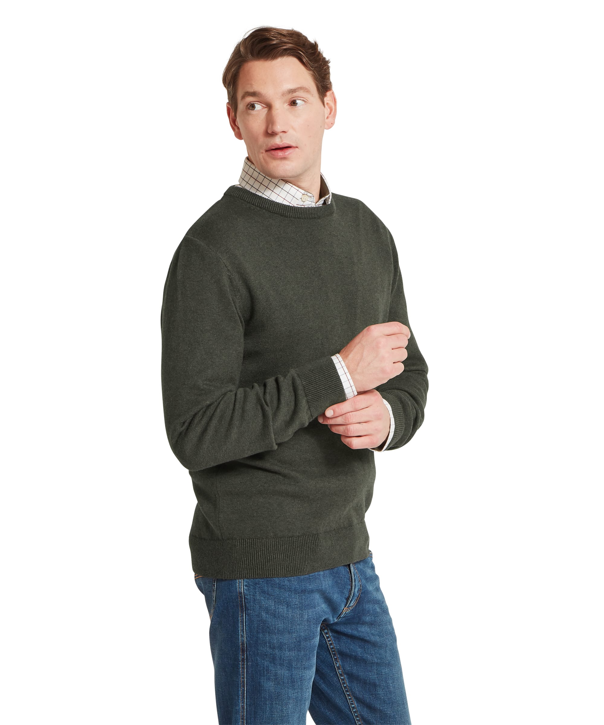 Schöffel Men's Calton Cotton Cashmere Crew Jumper in Green — three-quarter side view showing ribbed crew neck and smooth knit body with check shirt cuffs visible