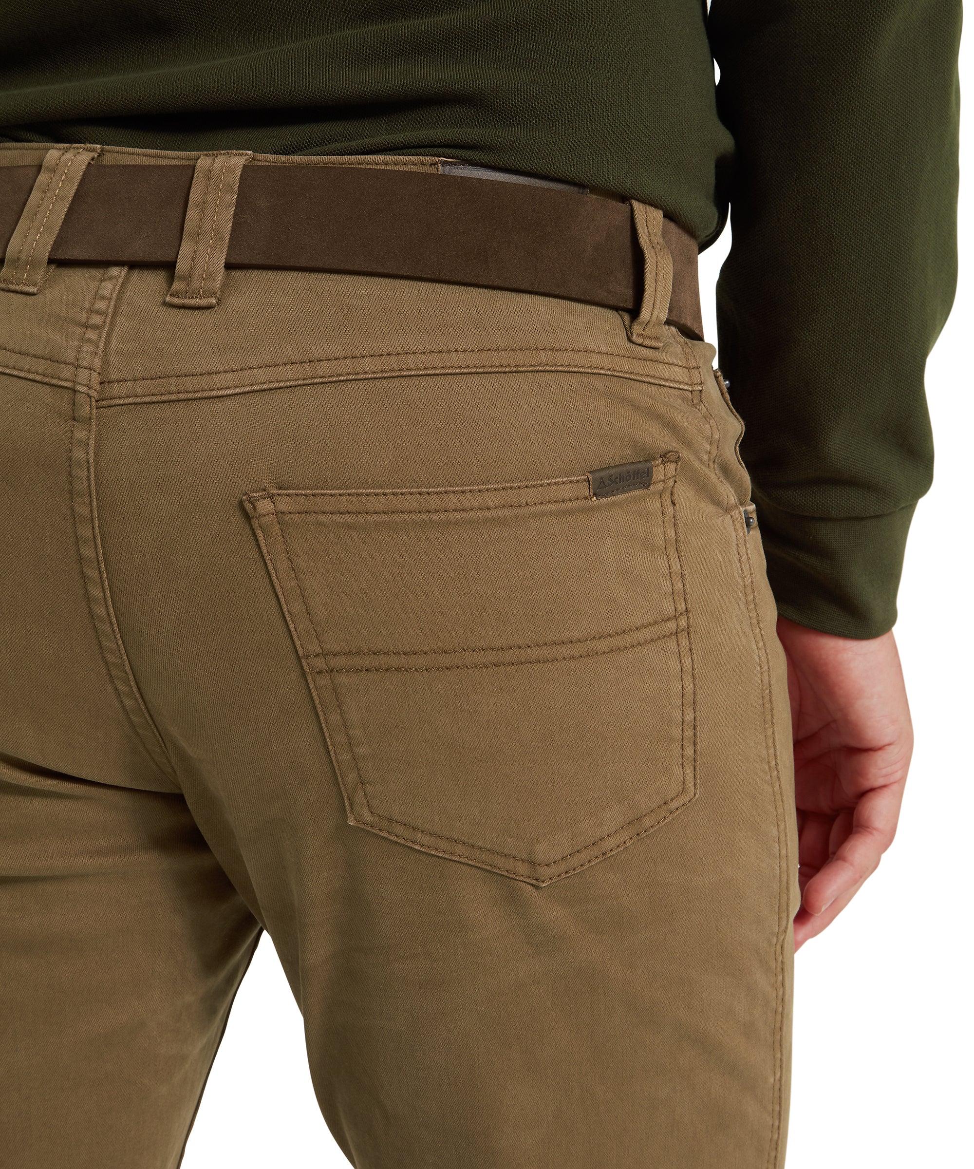 Brown pants with a visible Schöffel  logo on a white background