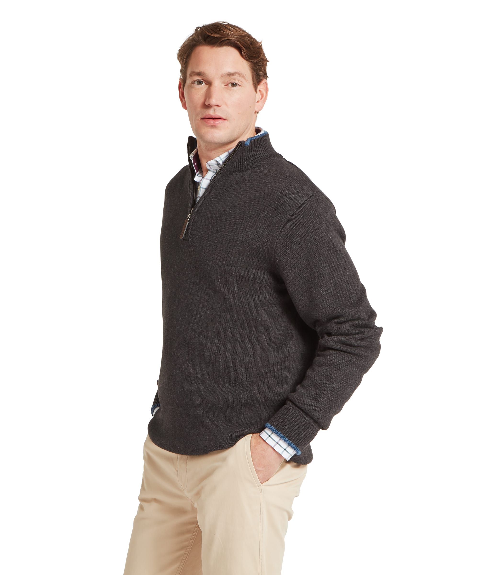 Schöffel Men's Castlebay 1/4 Zip Jumper in Charcoal — three-quarter side view showing ribbed quarter-zip collar and smooth knit body, layered over a check shirt with chinos