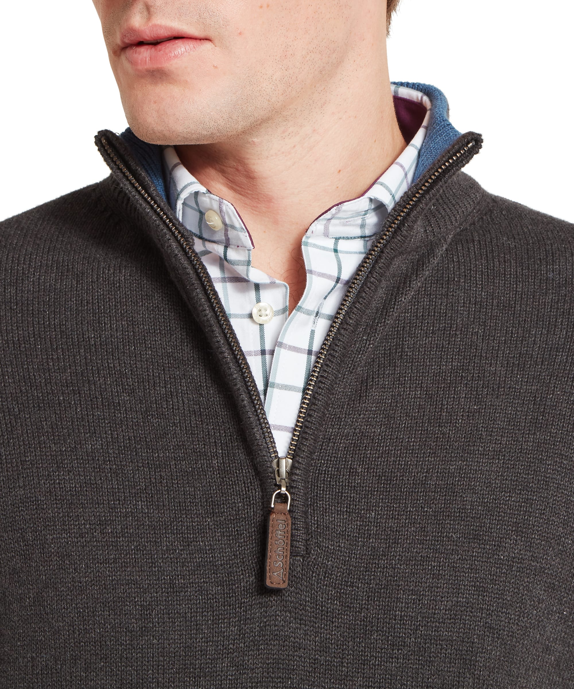 Schöffel Men's Castlebay 1/4 Zip Jumper in Charcoal — close-up of ribbed stand collar, leather-tipped Schöffel branded zip pull and layered check shirt detail