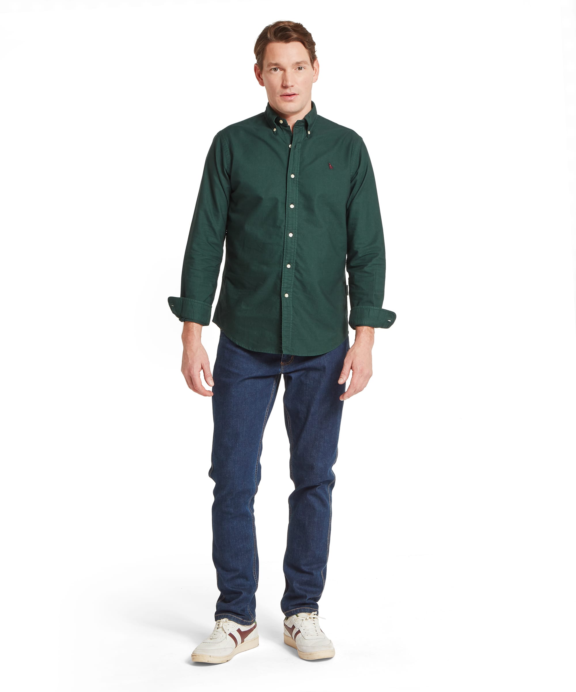 Schöffel Men's Cavendish Oxford Shirt in Green — full-length front view styled with dark indigo jeans and white retro trainers