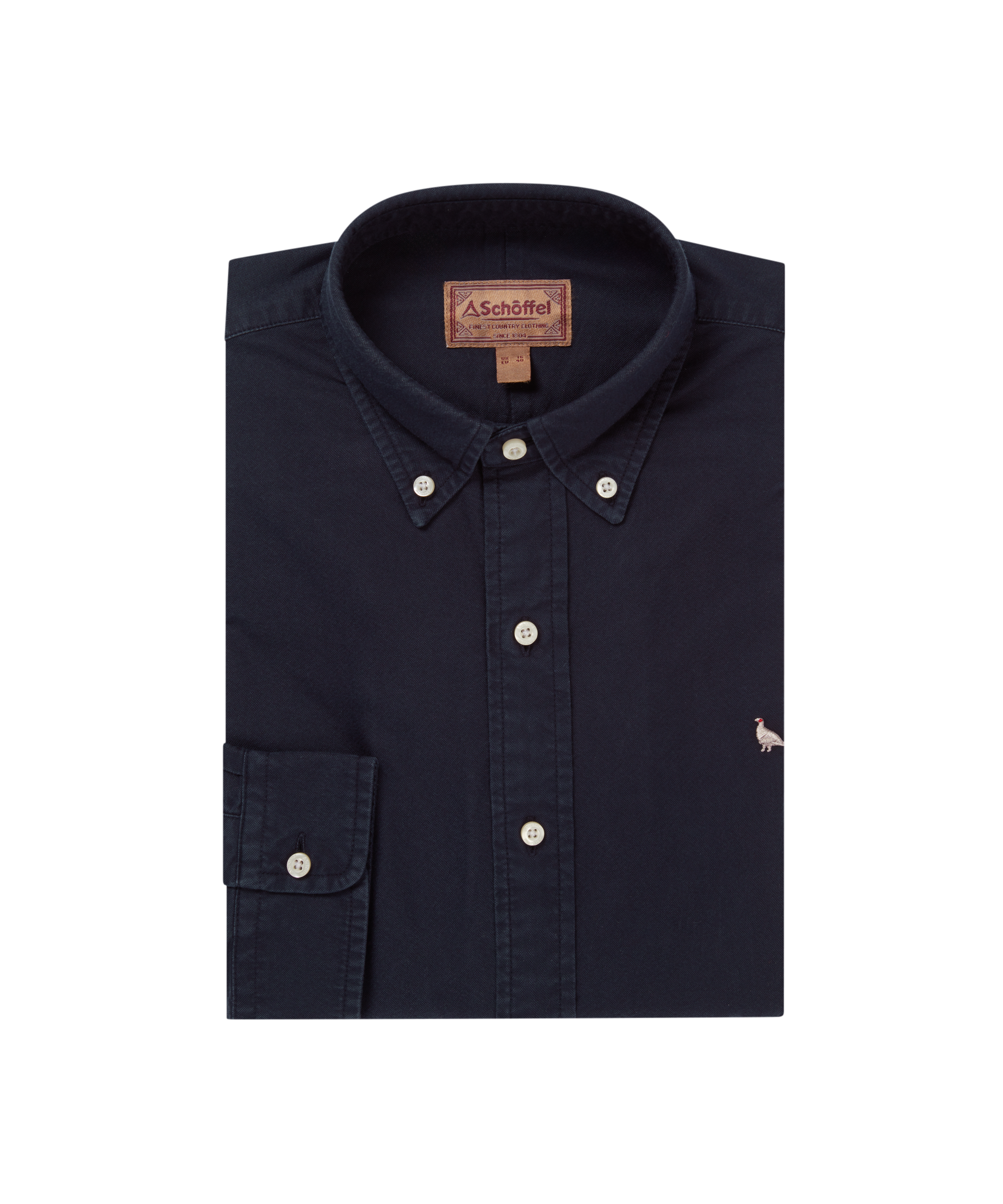 Folded navy shirt with brand label on a white background