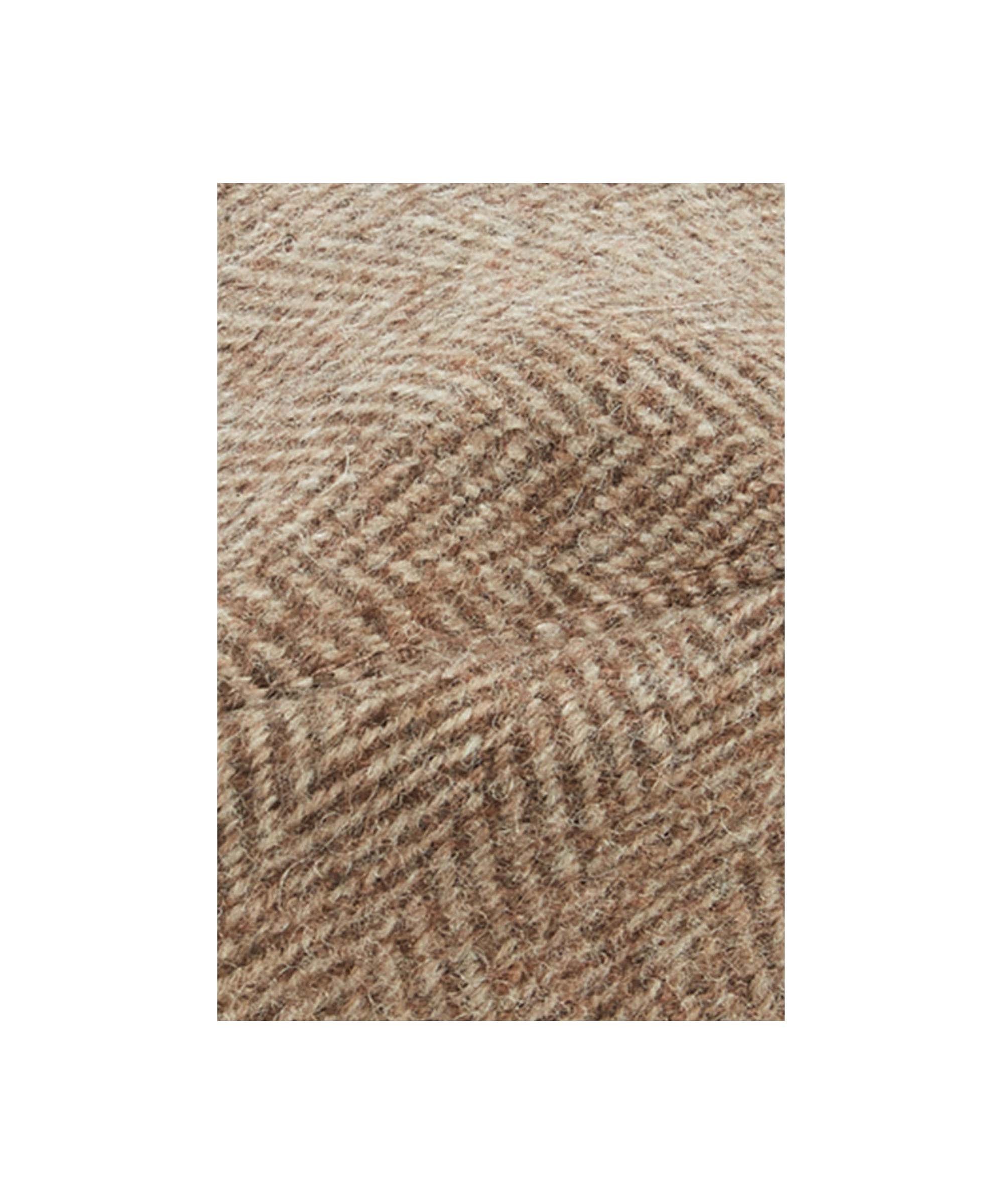 Close up of a Schöffel countryman tweed cap.