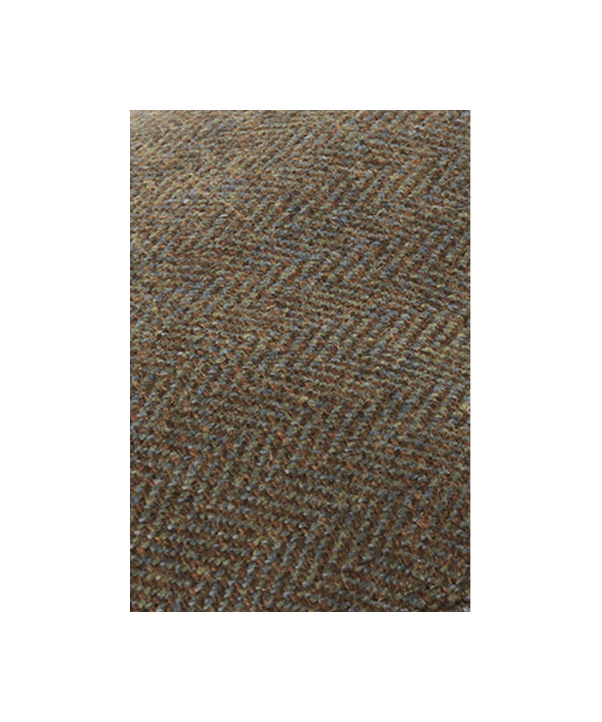 Schöffel Men's Countryman Tweed Cap in Green mixed herringbone tweed fabric close-up detail.