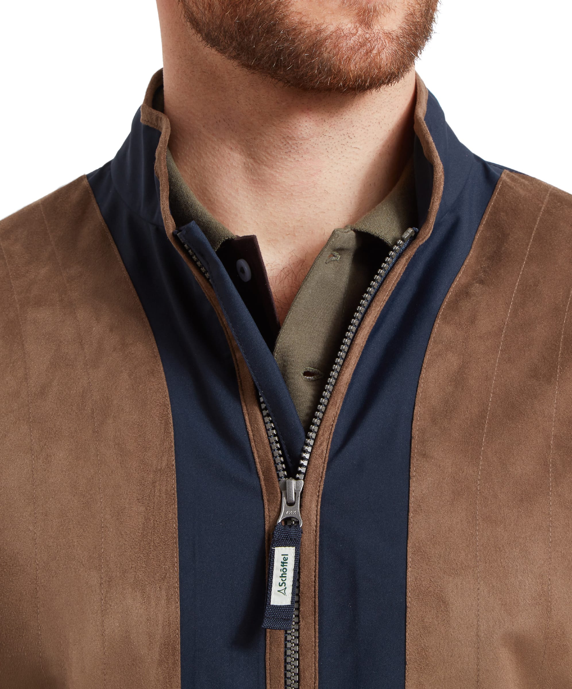 Schöffel Men's Grimsthorpe Clay Shooting Jacket in Blue — close-up of stand collar showing suede trim, Schöffel branded zip pull and layered polo shirt beneath