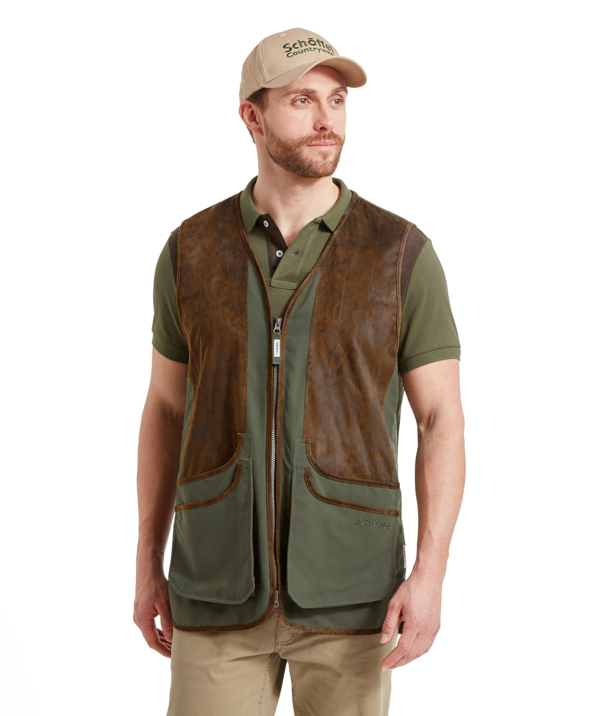 Man wearing the Schöffel Grimsthorpe Clay Shooting Vest in Green with a branded cap, front view styled with a polo shirt and chinos.