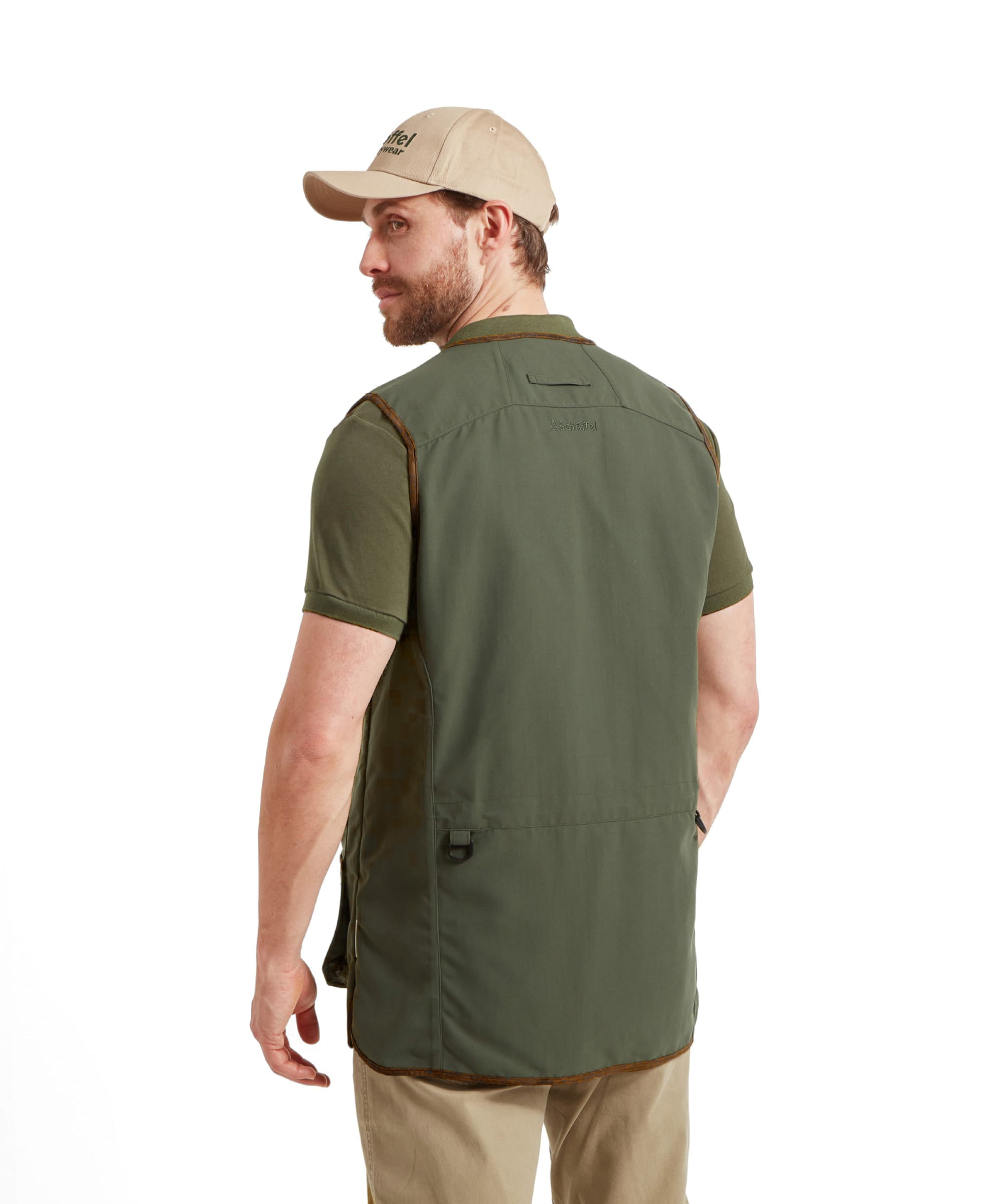 Man wearing the Schöffel Grimsthorpe Clay Shooting Vest in Green with a branded cap, back view detail.