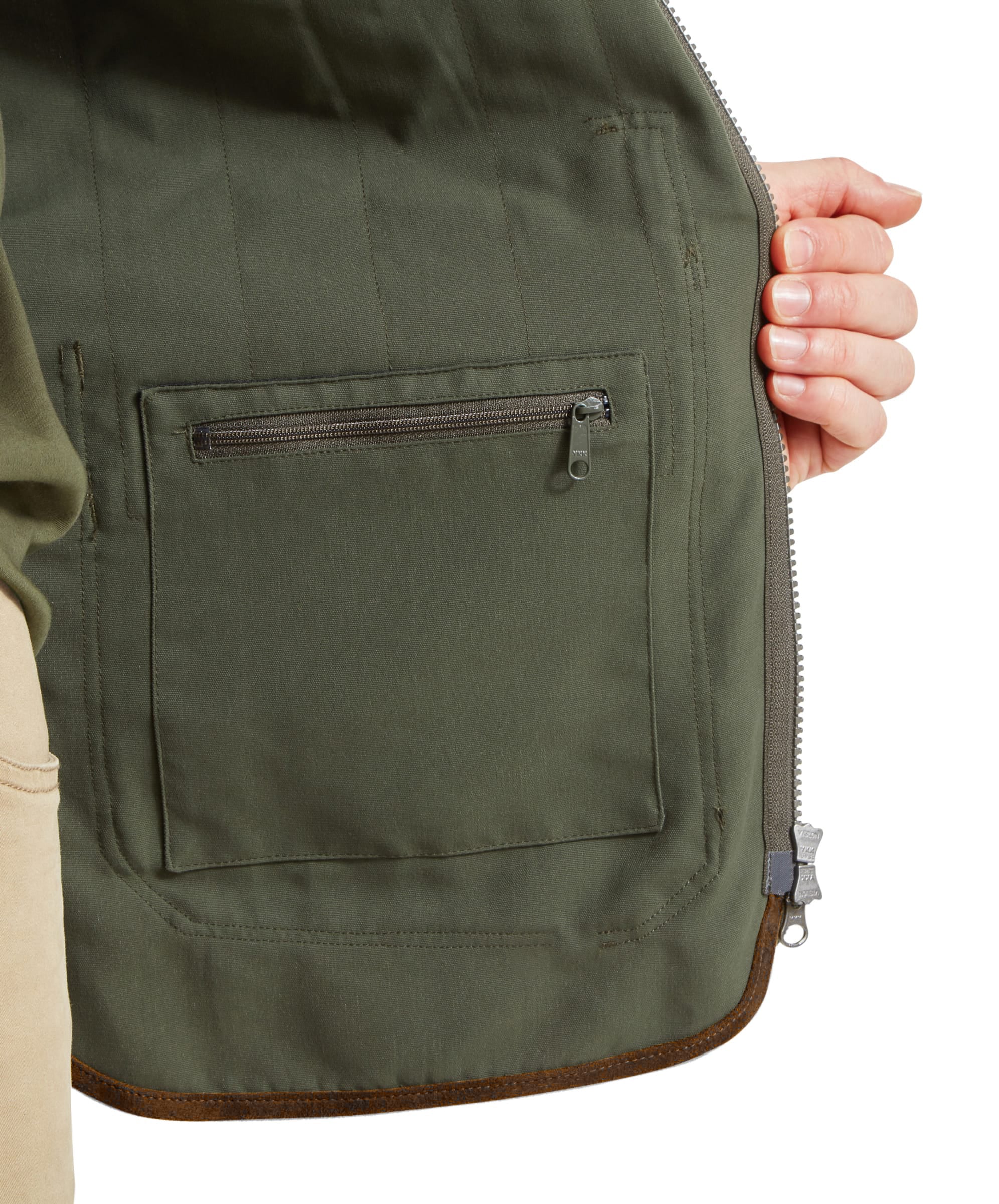 Close-up of the Schöffel Grimsthorpe Clay Shooting Vest in Green, showing the rear zip pocket and leather-look edge trim.