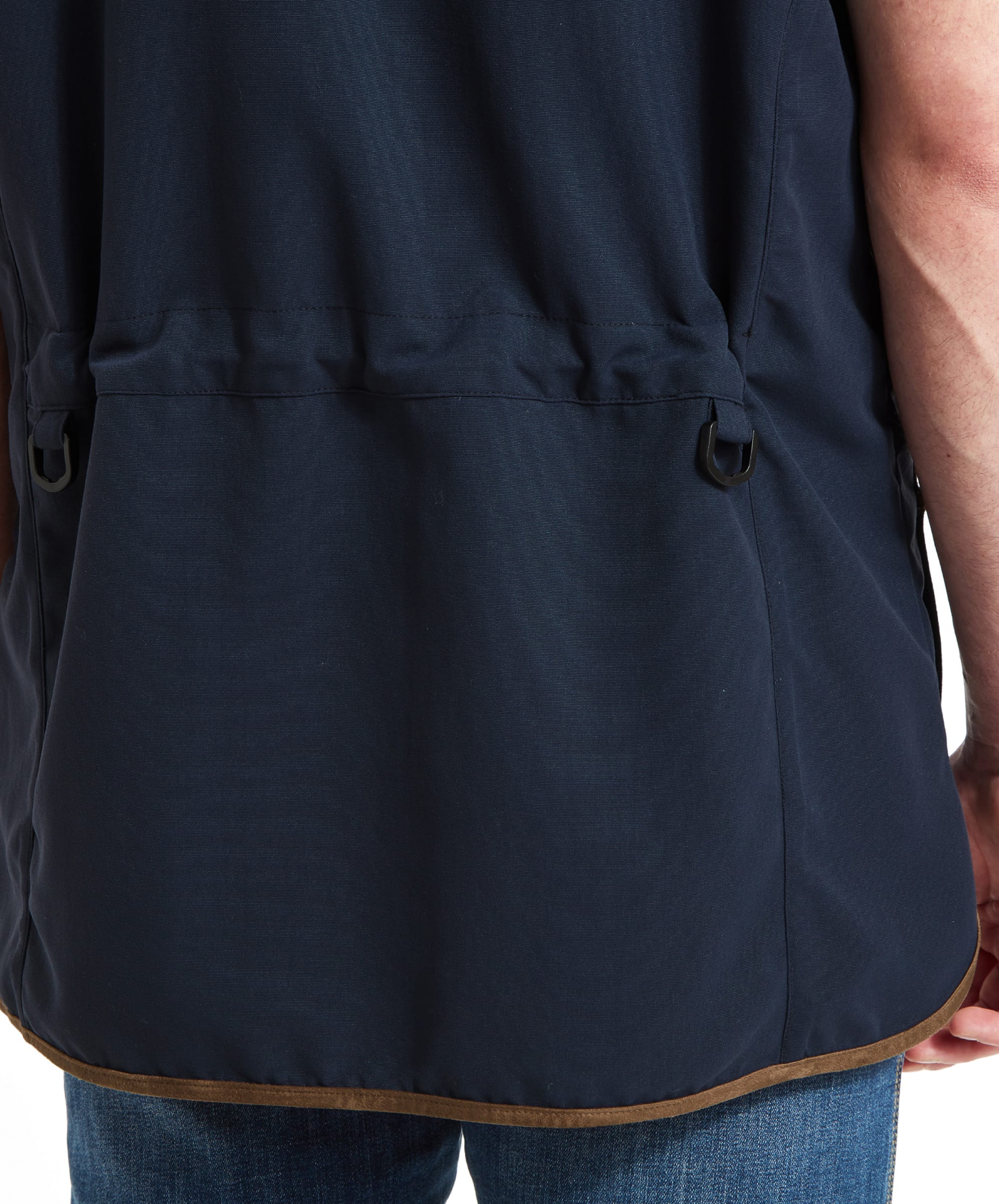 Schöffel Men's Grimsthorpe Clay Shooting Vest in Blue — close-up of deep cartridge pocket showing Schöffel embroidered logo, suede trim edging and woven label detail