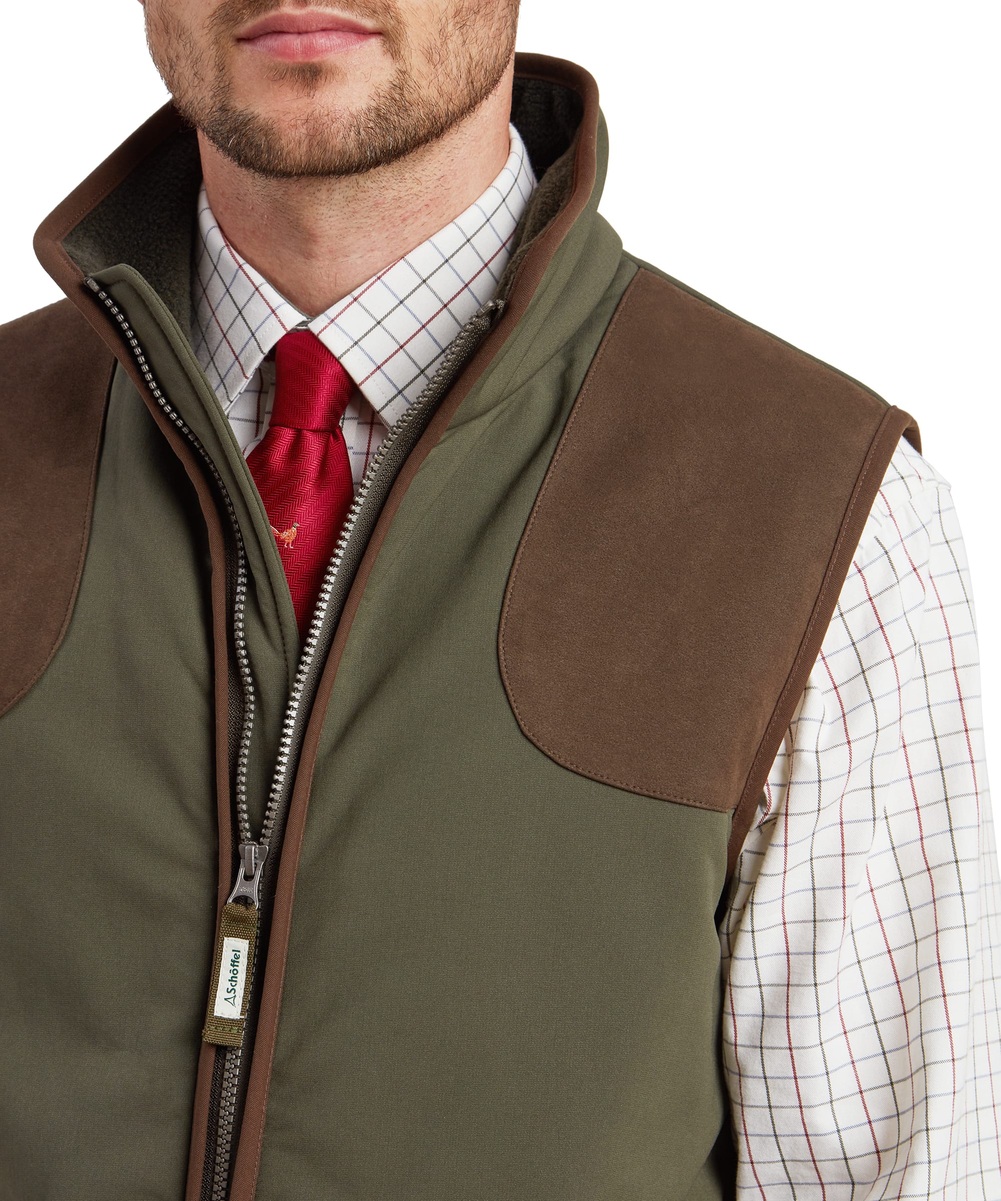 Schöffel Men's Gunby Gilet in Green — close-up of suede shoulder patch, stand collar with fleece lining, Schöffel branded zip and layered check shirt with tie