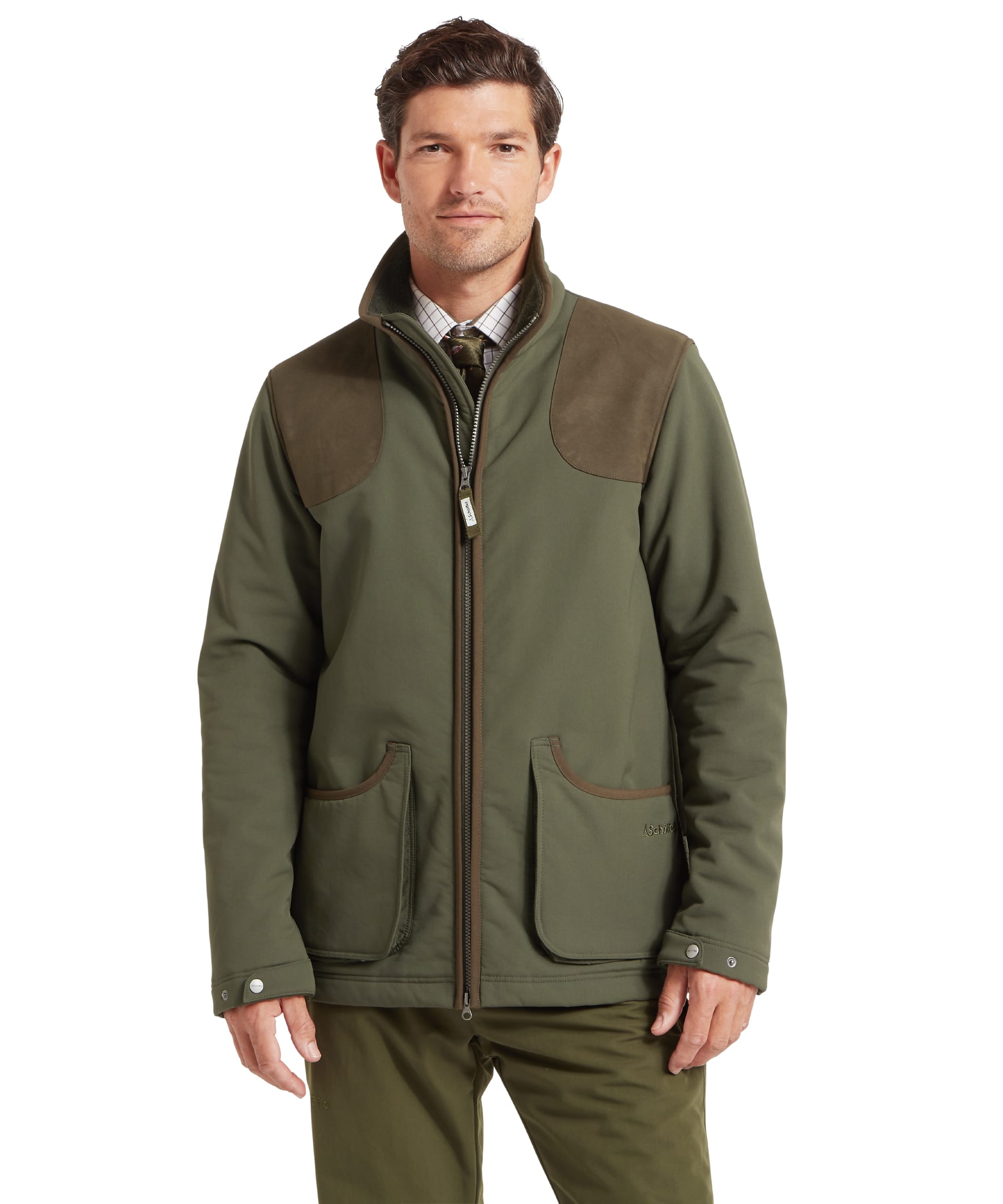 Schöffel Men's Gunby Jacket in Green — front view showing contrast suede shoulder patches, large lower pockets with suede trim, Schöffel branded zip and fleece-lined collar, layered over a check shirt and tie