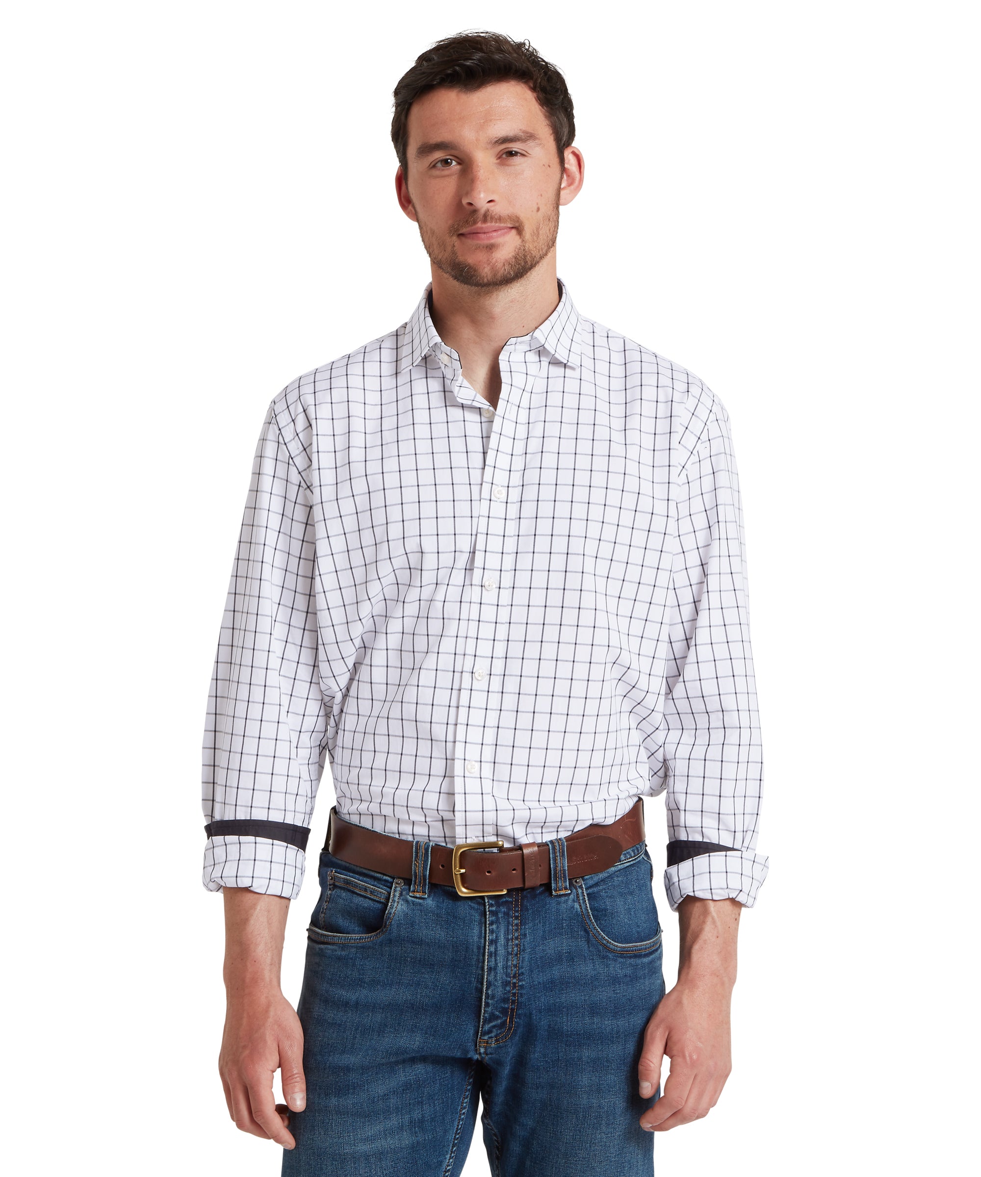 Man wearing a checkered shirt and jeans on a white background