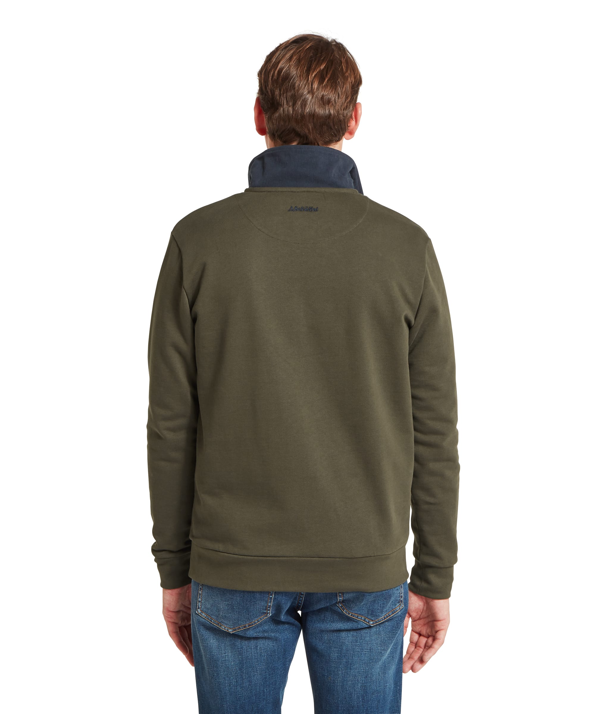 Schöffel Men's Horseley Rugby Sweatshirt in green, rear view showing clean construction with contrast navy collar and Schöffel embroidered logo at back neck, worn with blue jeans