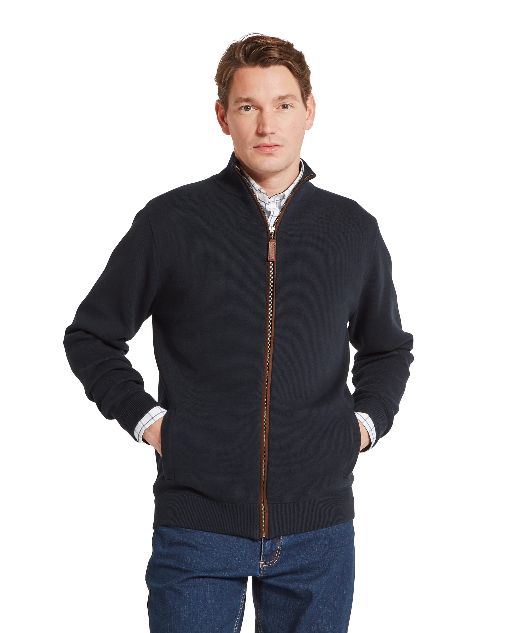 Schoffel Mens Marlow Full-Zip Jumper in navy, front view showing full-length zip with contrast tan leather zip pull and trim, ribbed cuffs and hem, layered over a check shirt
