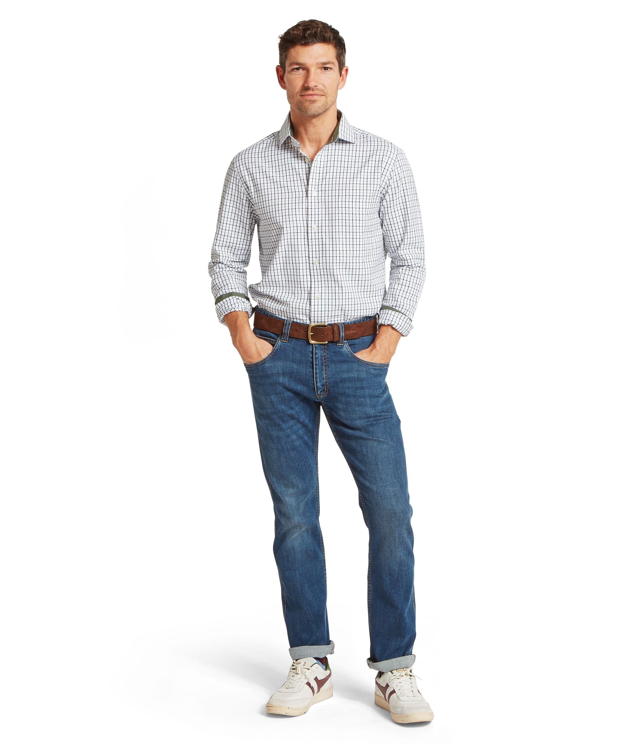 Schoffel Mens Milton Tailored Shirt in blue and olive windowpane check worn with blue jeans, leather belt and white trainers, full length front view showing relaxed country casual styling