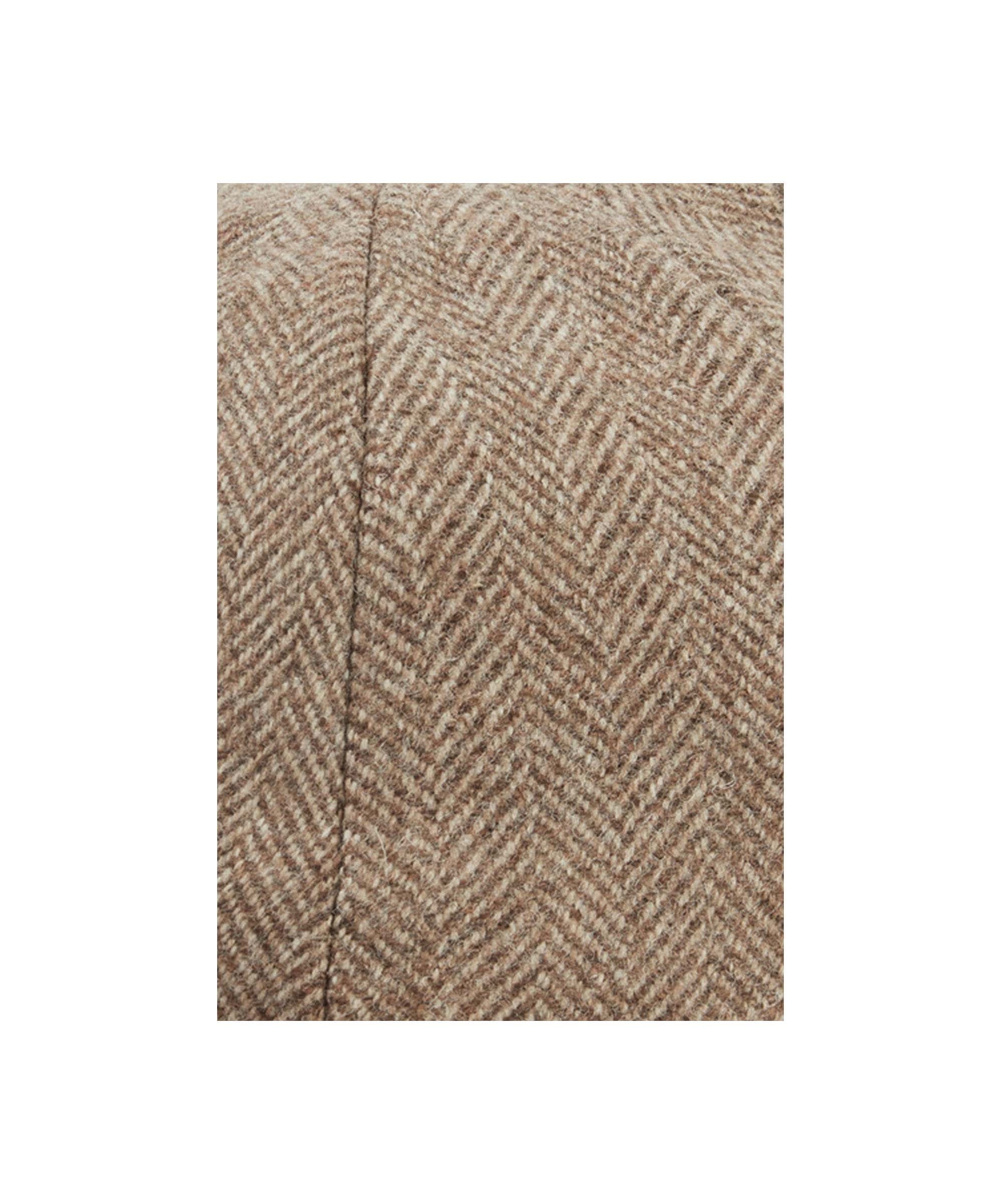 Close up of a Schöffel men's newsboy cap showing the tweed material