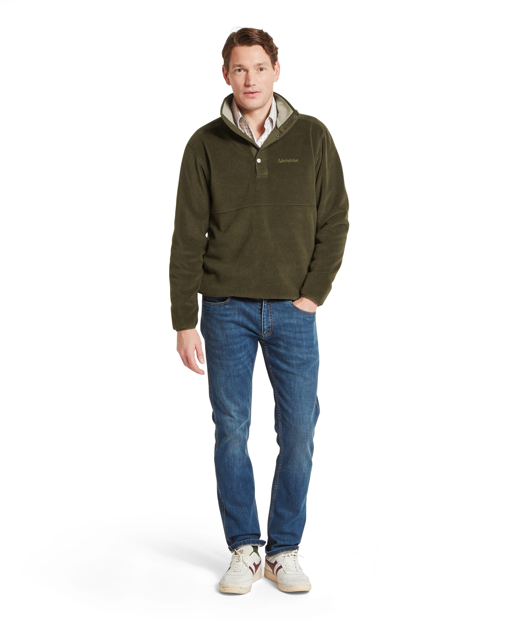 Schoffel Mens Norton Fleece in dark olive green worn with blue jeans and white trainers, full length front view showing snap-button neck placket, Schoffel logo and relaxed country casual outfit