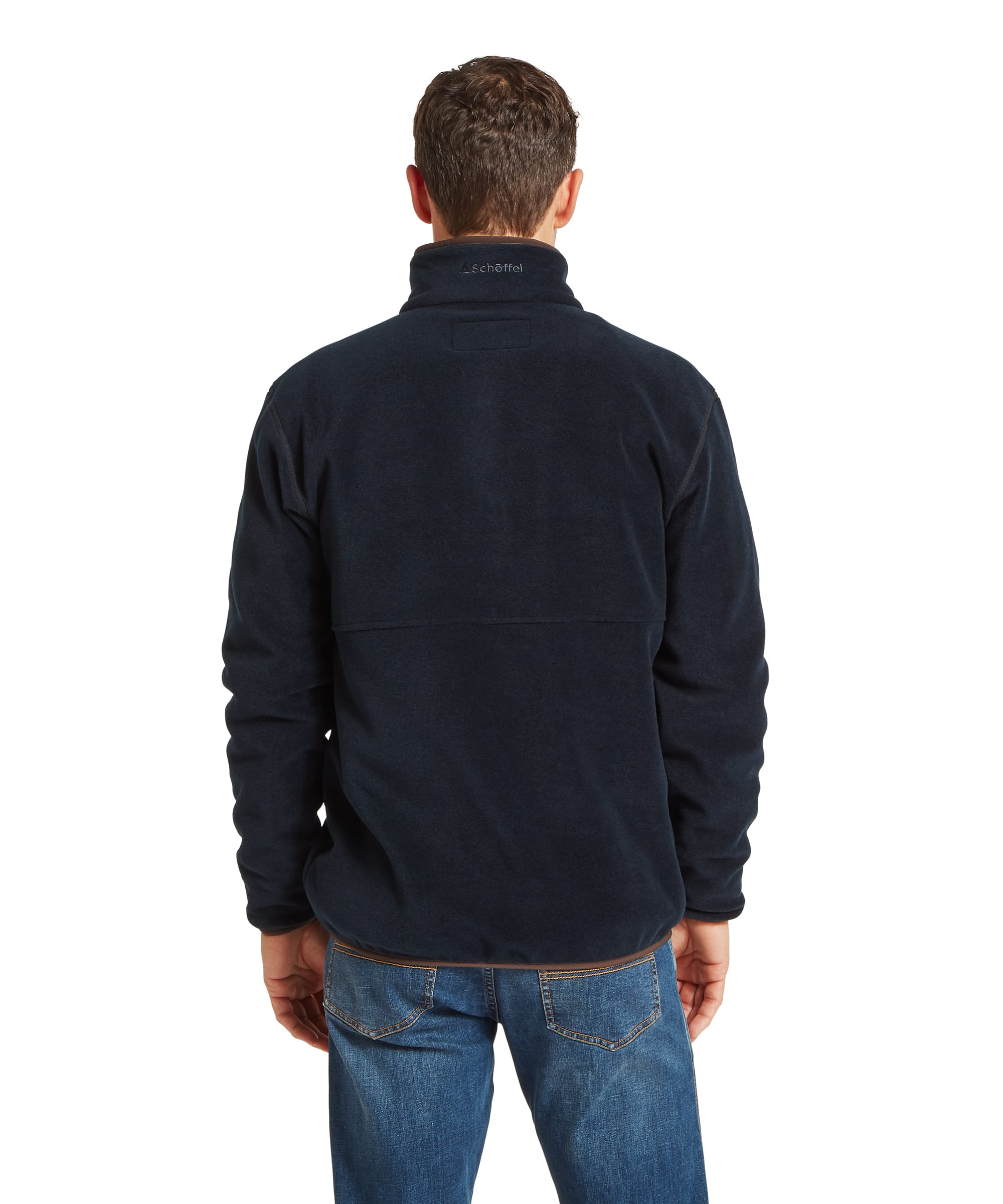 Schoffel Mens Norton Fleece in navy, rear view showing panelled fleece construction with Schoffel embroidered back neck logo, contrast dark brown collar trim and relaxed fit, worn with blue jeans