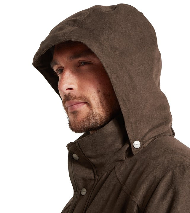 Man wearing a brown hooded jacket on a white background