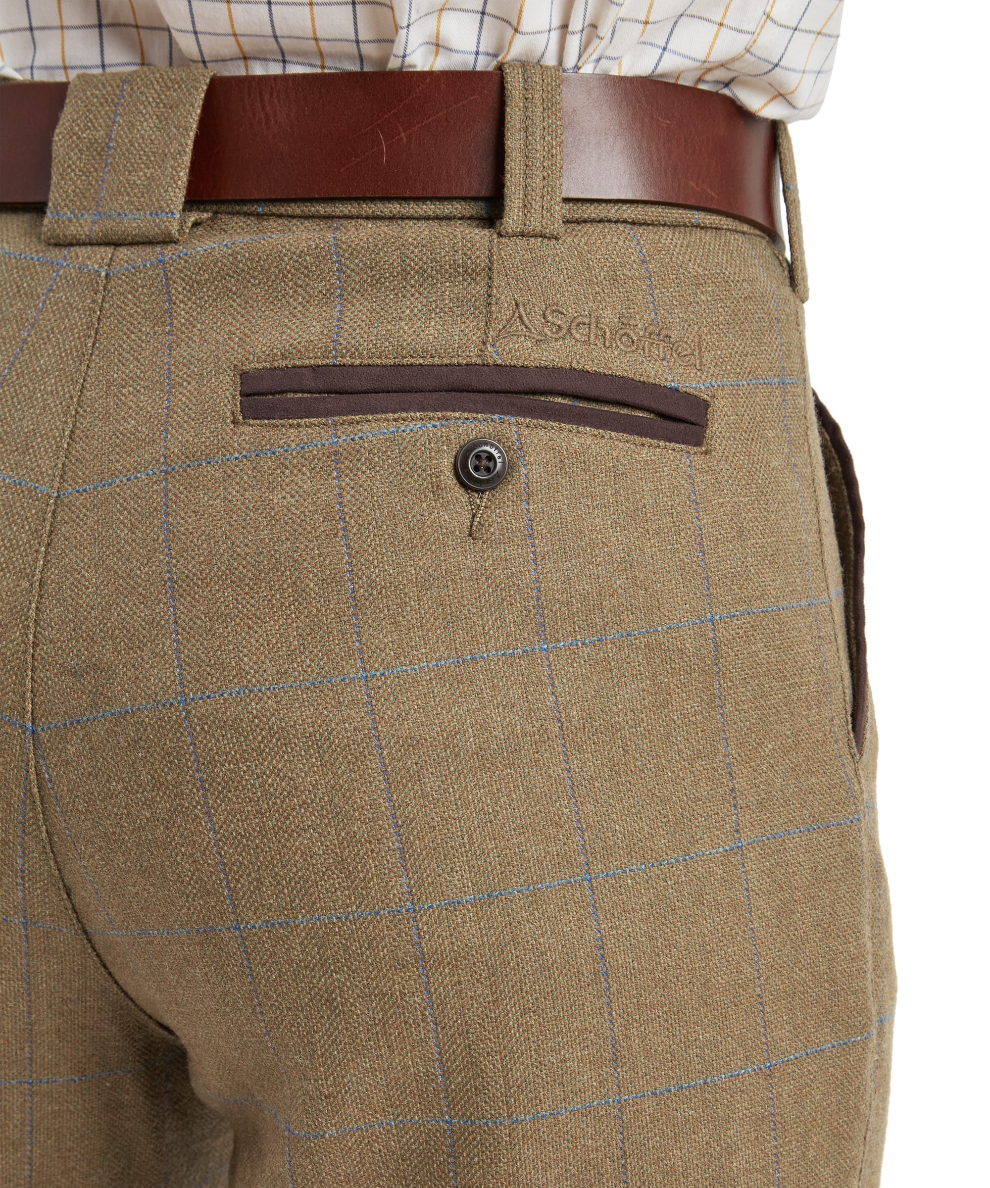Schöffel Men's Ptarmigan Tweed Plus Twos in brown Lochlane windowpane check — close-up rear pocket detail showing Schöffel embroidered logo, brown suede zip welt back pocket and the fawn Lochlane tweed with blue overcheck fabric texture
