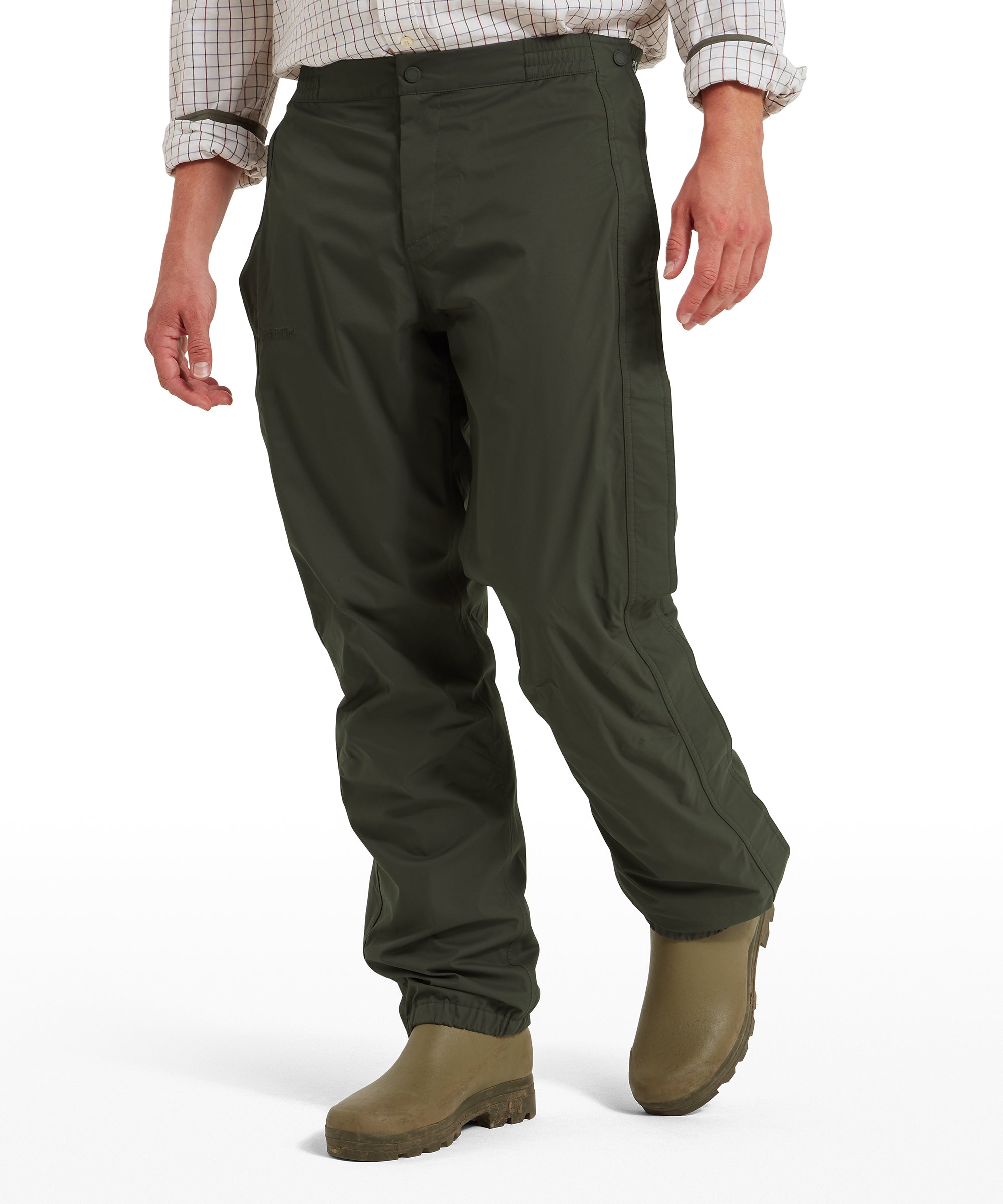 Schöffel Saxby men's overtrousers in green, full-length front view worn with wellington boots, showing straight fit and side seam detai