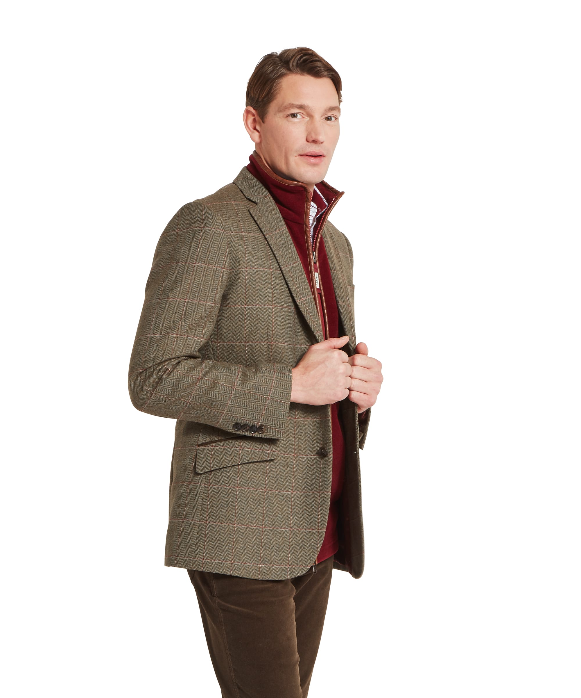 Schöffel Men's St Andrews Tweed Sports Jacket in Lovat brown Lochlane windowpane check — close-up of the three-button sleeve cuff showing dark horn buttons and the classic herringbone tweed weave with red and buff overcheck detail