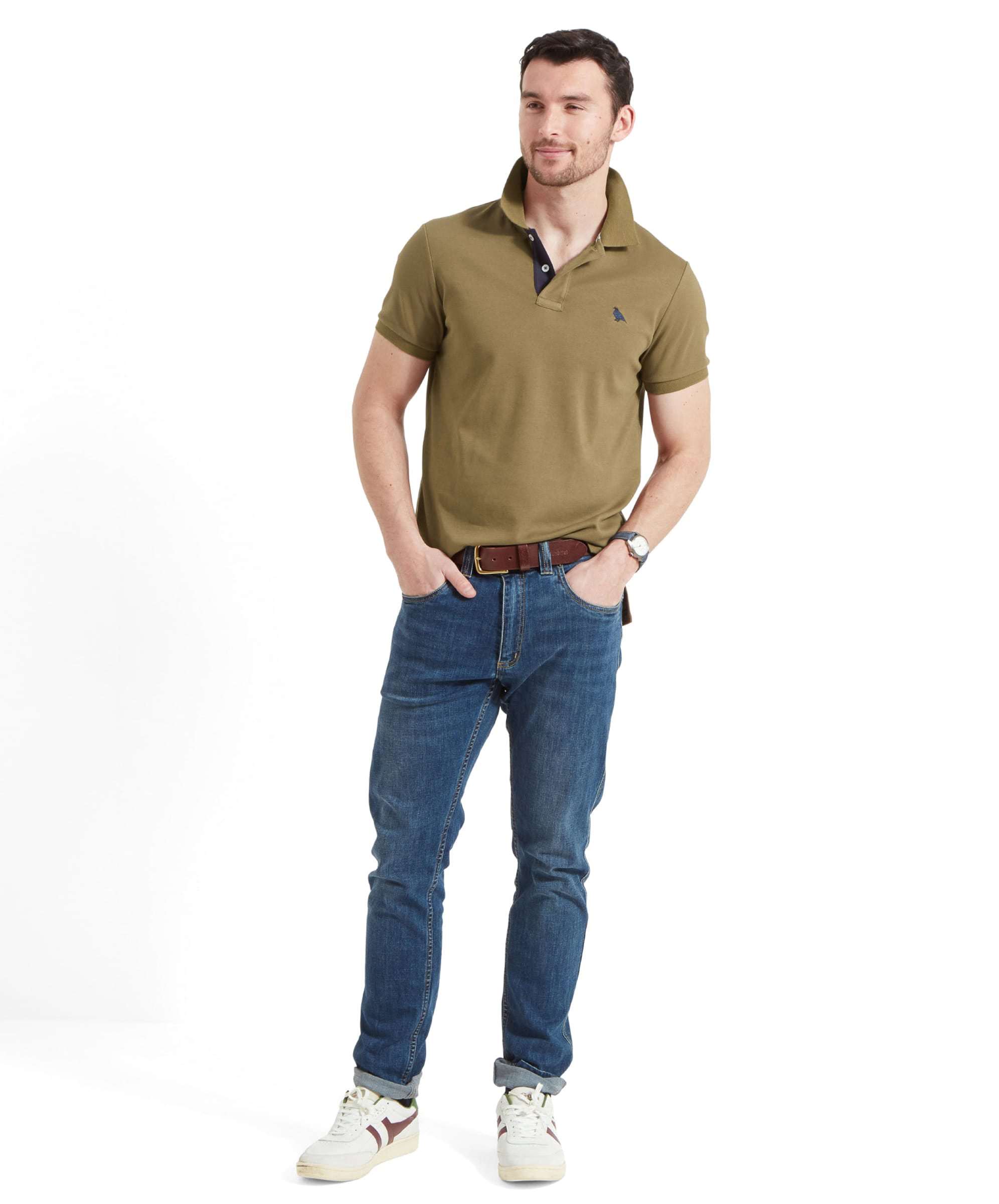 Schöffel Men's St Ives Jersey Polo Shirt in olive green, full-length view on model paired with denim jeans and trainers