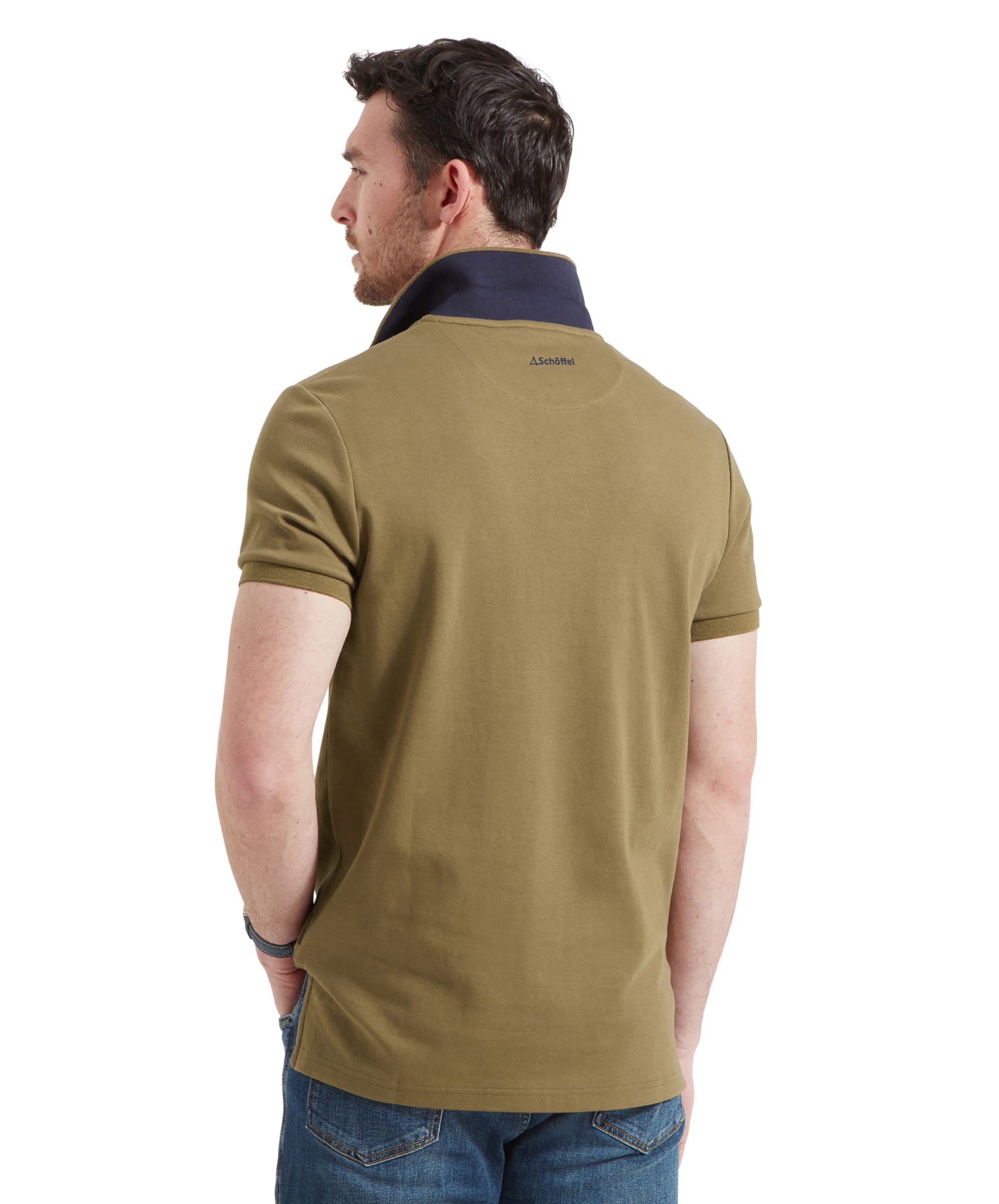 Schöffel Men's St Ives Jersey Polo Shirt in olive green, back view on model showing Schöffel neck branding, styled with denim jeans