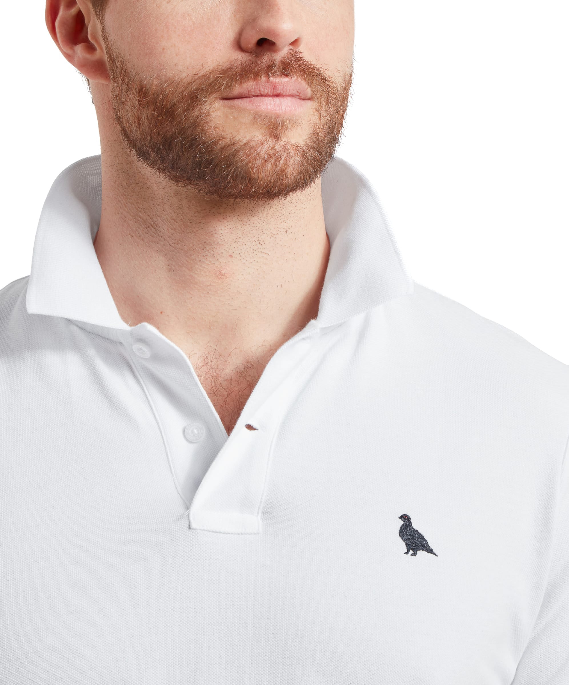 Schöffel Men's St Ives Polo Shirt in white, close-up on model showing embroidered grouse logo and two-button placket