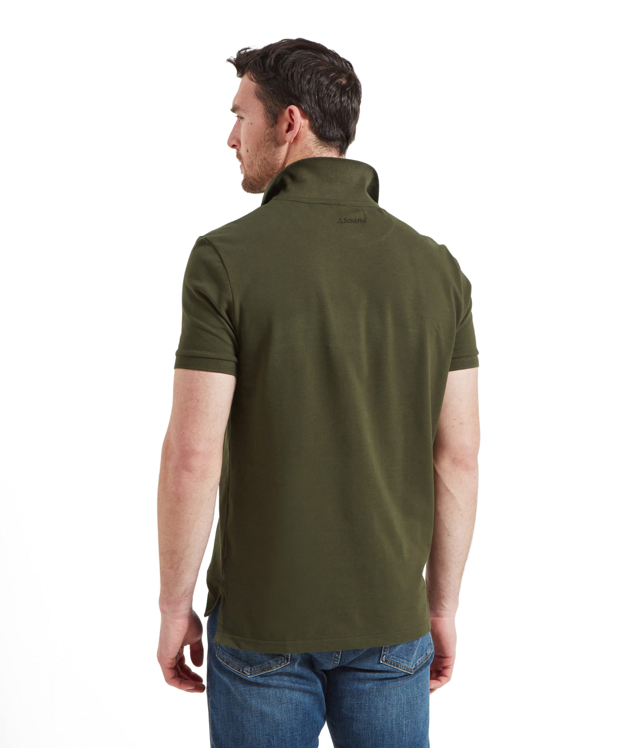 Schöffel Men's St Ives Polo Shirt in olive green, back view on model showing Schöffel neck branding, styled with denim jeans