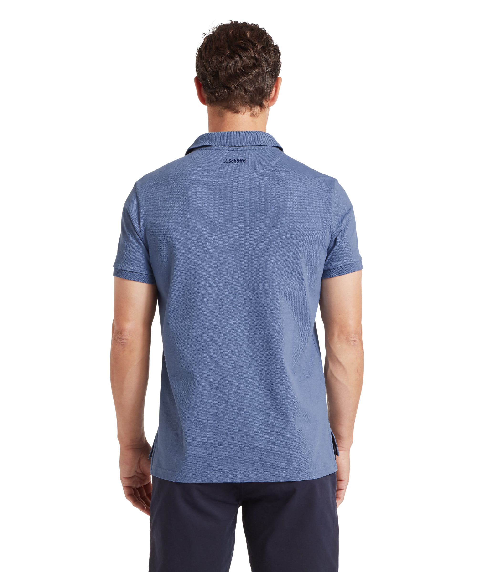 Schöffel Men's St Ives Polo Shirt in slate blue, back view on model, short-sleeve pique polo with Schöffel neck branding