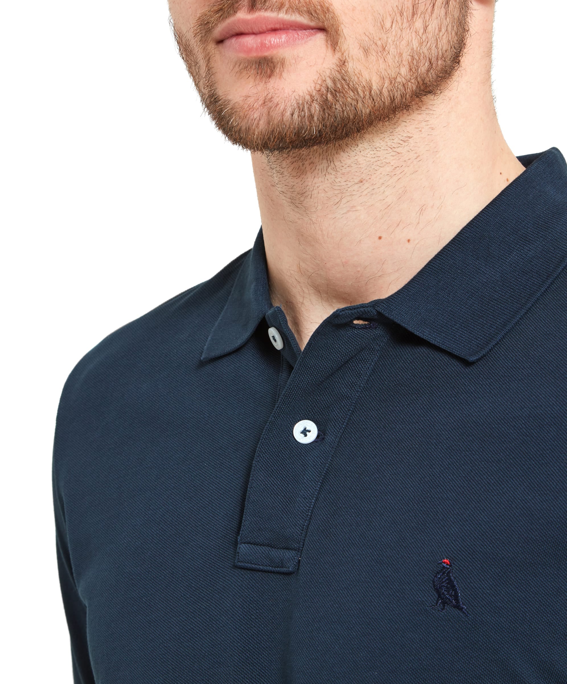 Schöffel Men's St Ives Polo Shirt in navy, close-up collar and placket detail on model, short-sleeve pique polo