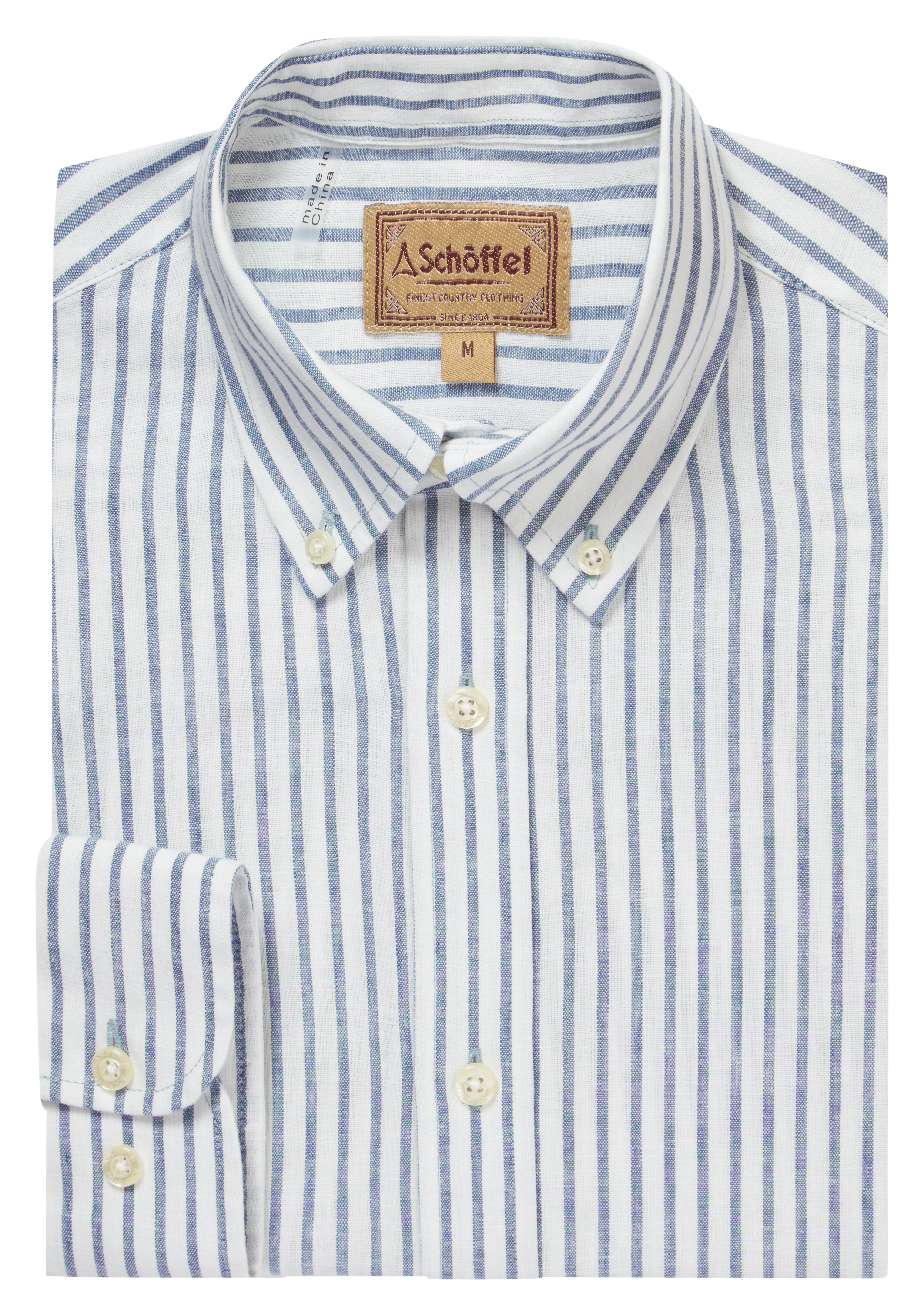 Blue and white striped shirt with a Schöffel label on a white background