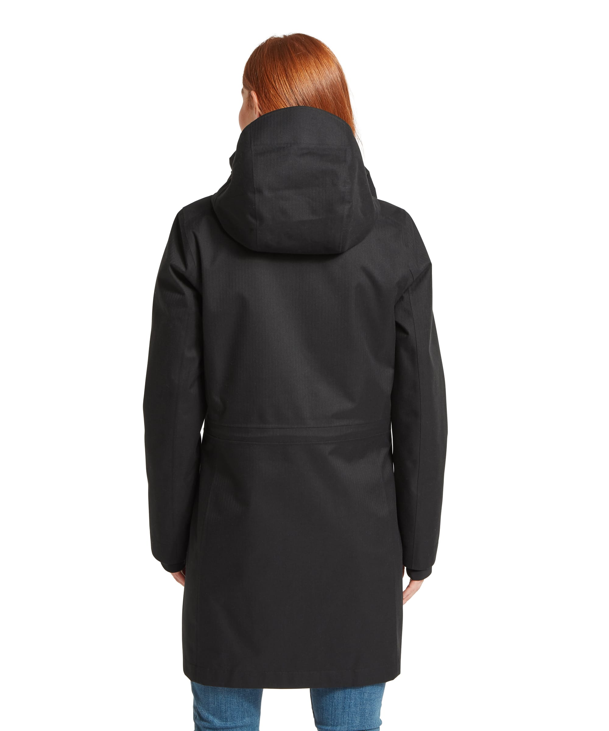 Rear view of the Women's Schöffel Allexton Waterproof Coat in charcoal grey, showing the tailored back seaming, generous adjustable hood and mid-length silhouette, paired with blue jeans.