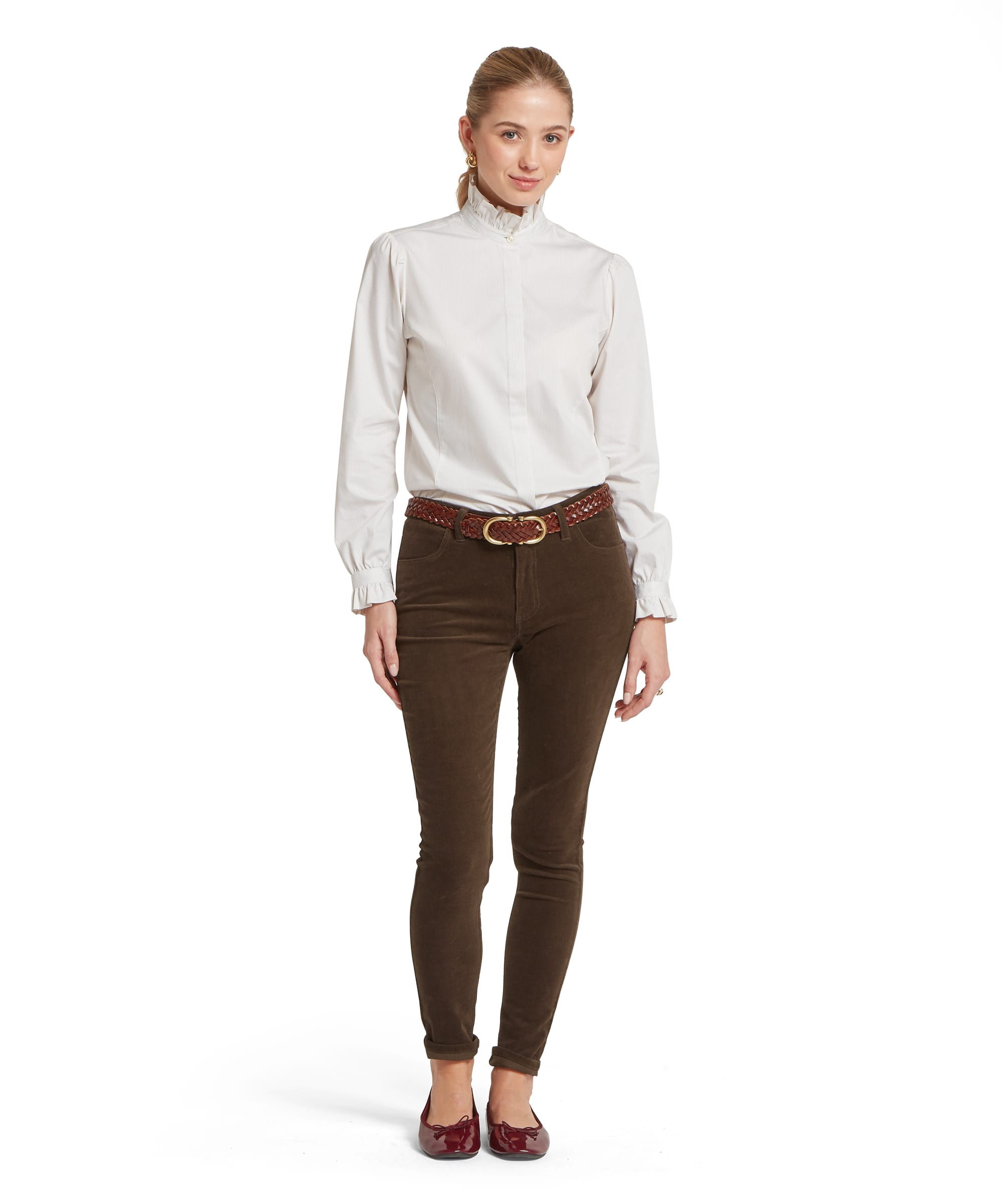 Schöffel Women's Clover Cord Jean in Dark Olive — full-length front view styled with ruffle-collar shirt and patent ballet pumps