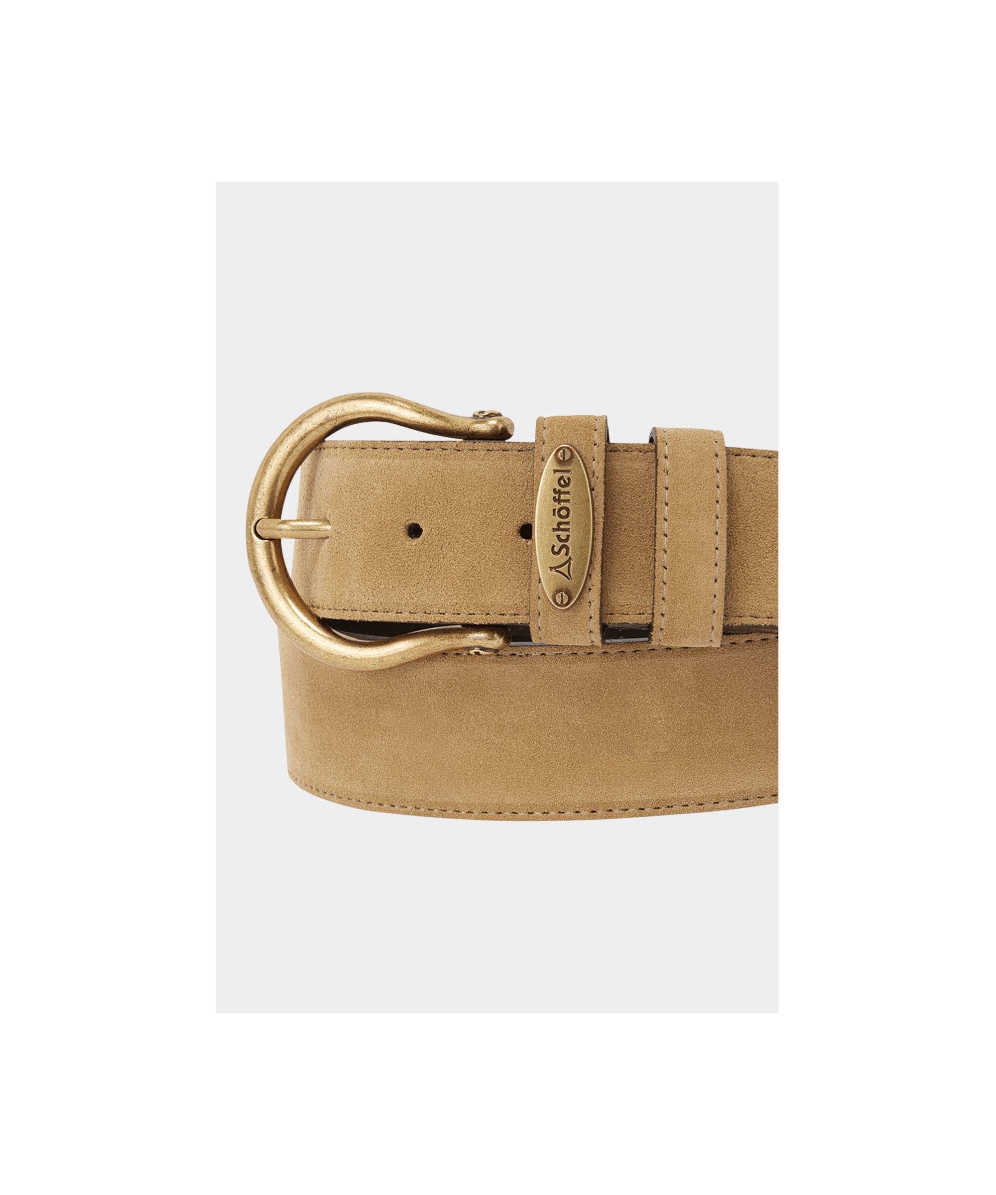Schöffel Women's Dovedale Suede Belt in Beige with antique gold horseshoe buckle and branded oval badge close-up detail