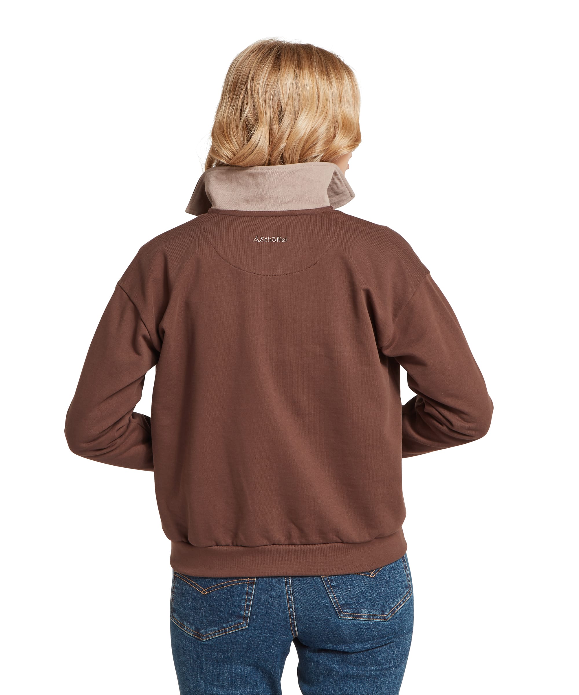 Back view of the Schöffel Women's Horseley Rugby Sweatshirt in Chocolate Brown, showing the Schöffel logo embroidered at the back neck, contrast camel collar, clean back seam and ribbed hem, worn with blue jeans