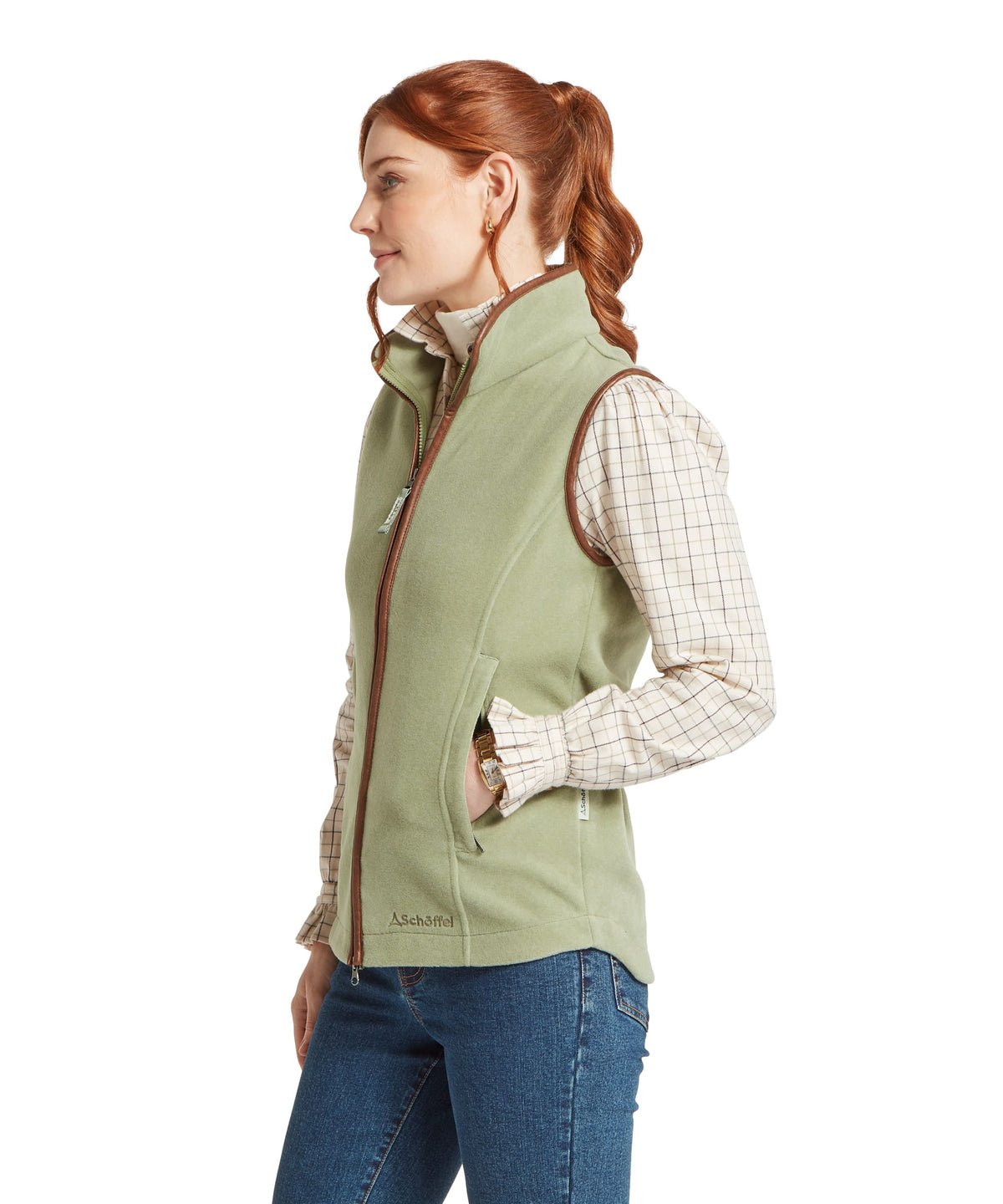 A sage green lyndon fleece gilet sleeveless vest with zip closure and brown leather trim